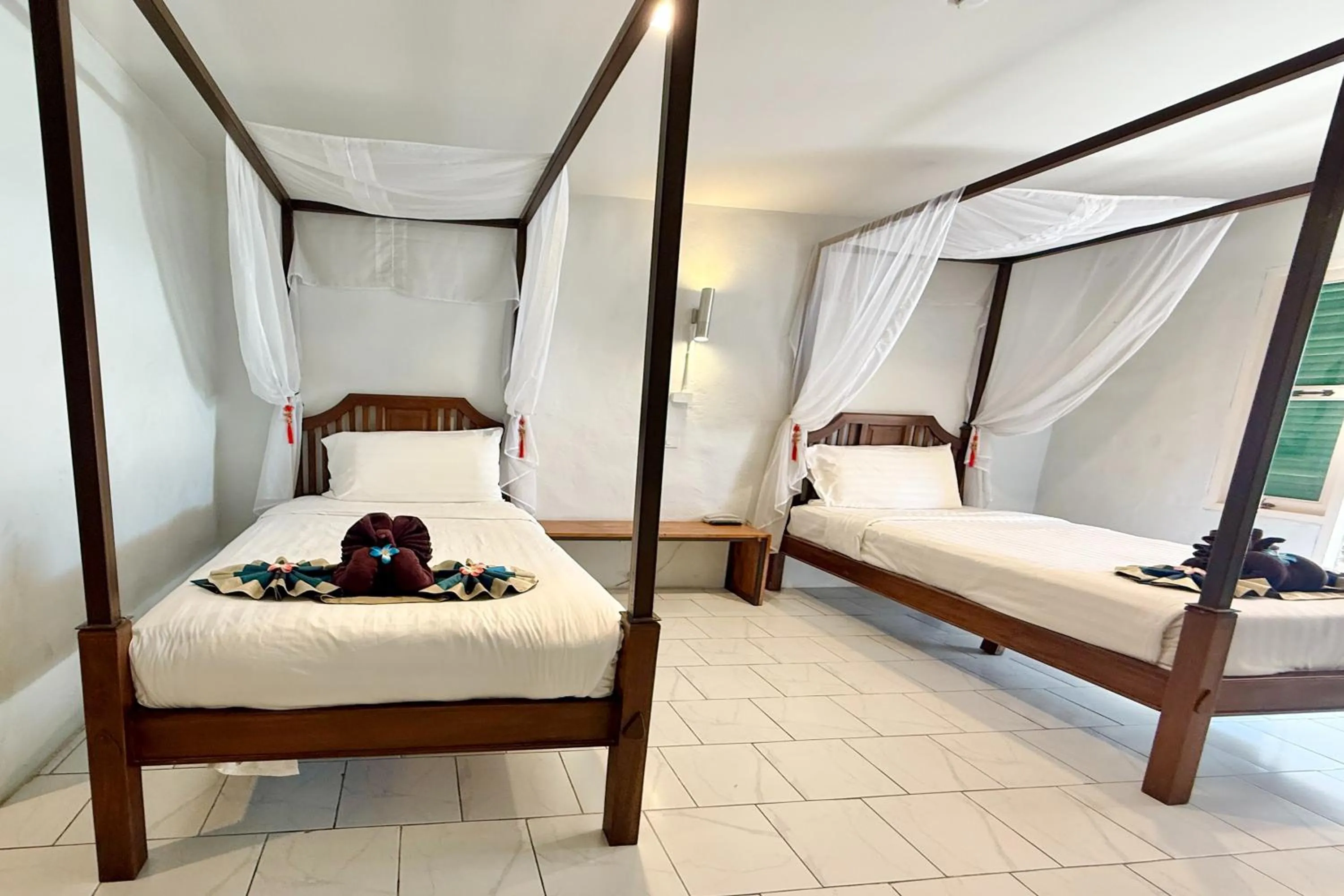 Bed in Sabaidee Chiangmai Hotel