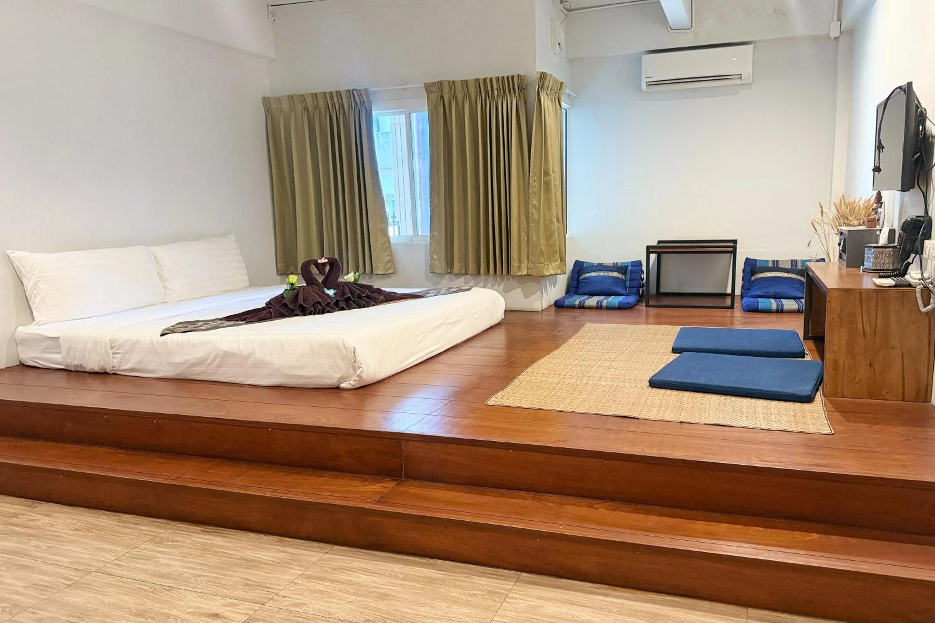 Bed in Sabaidee Chiangmai Hotel