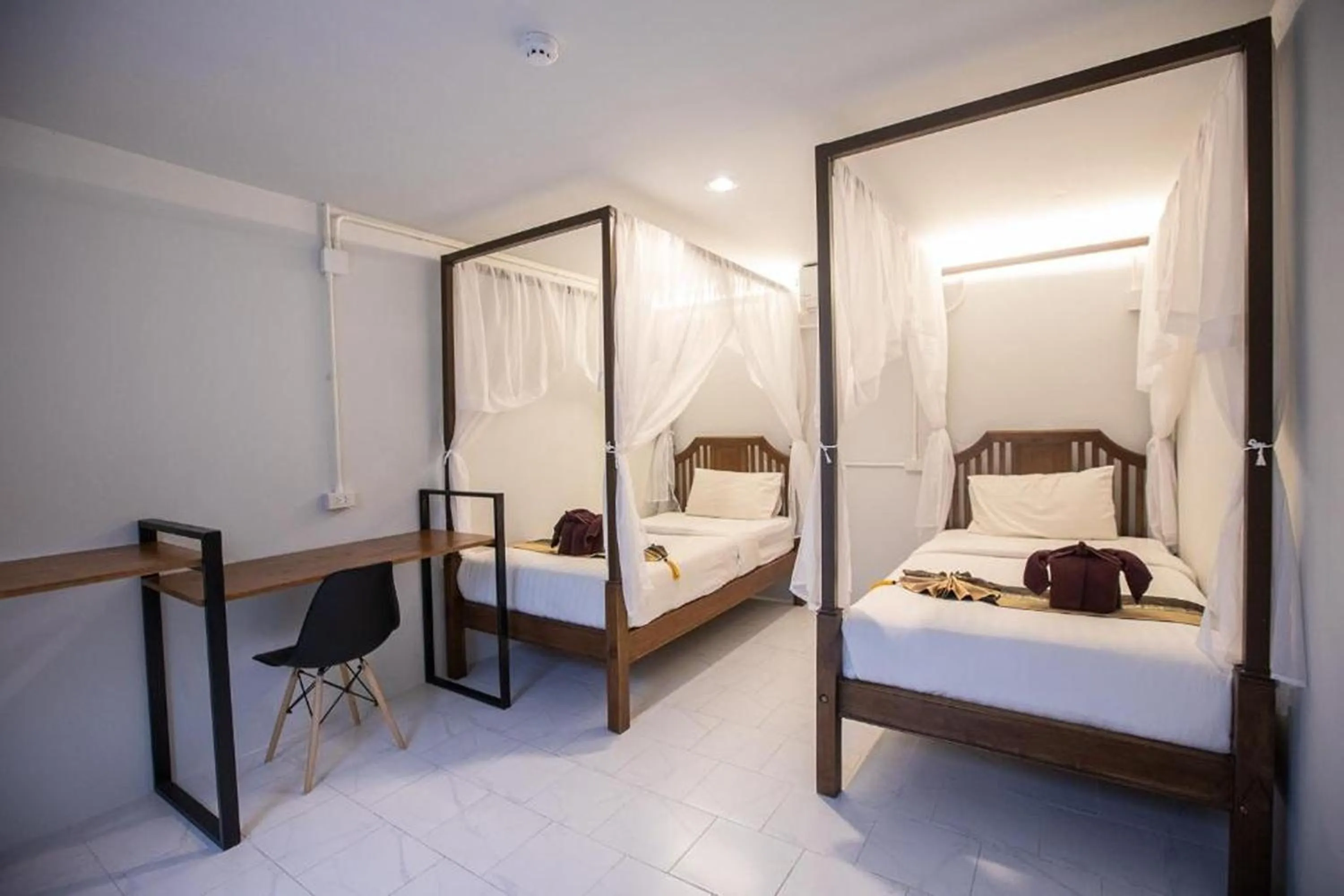 Bed in Sabaidee Chiangmai Hotel