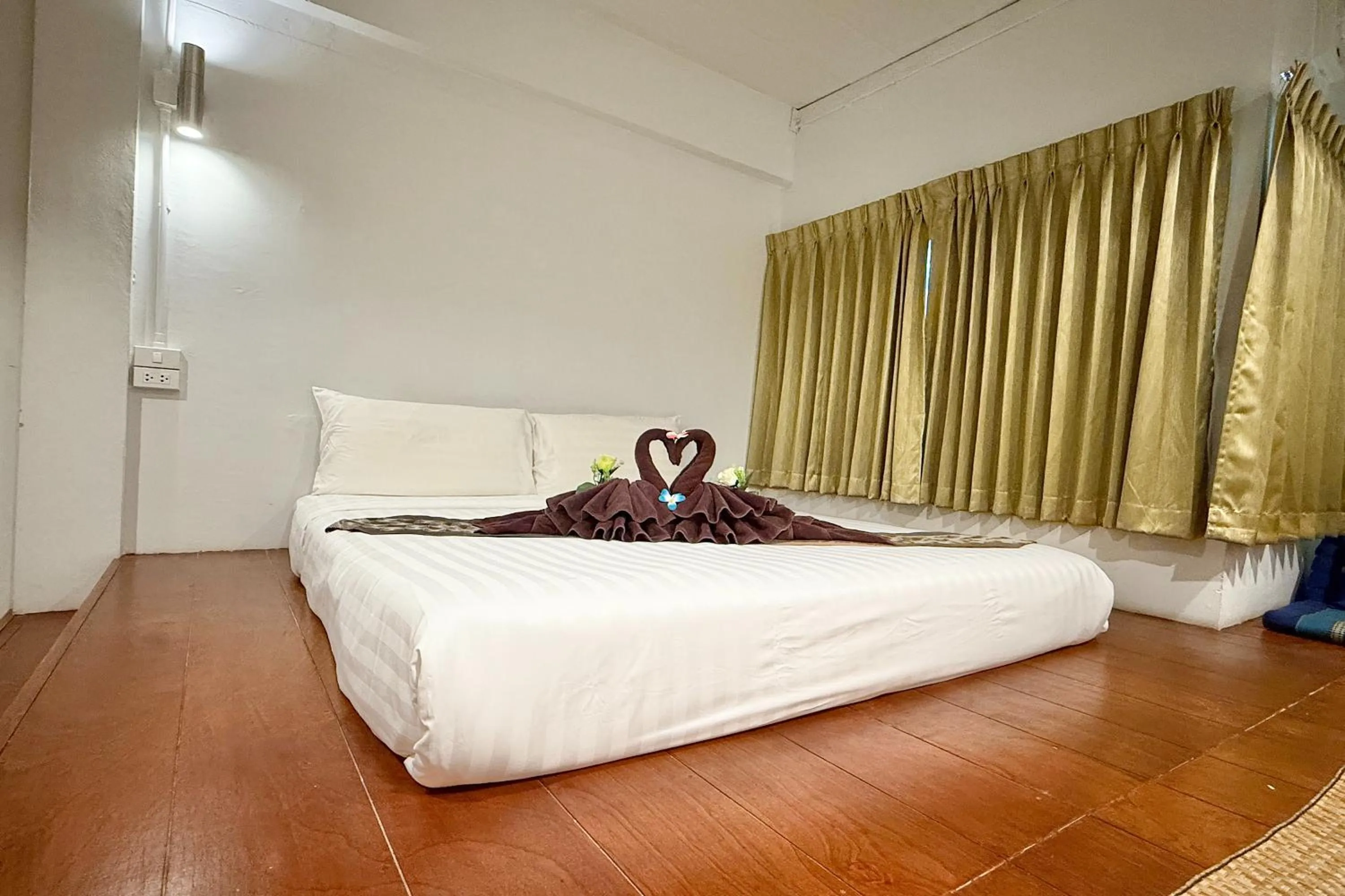Bed in Sabaidee Chiangmai Hotel