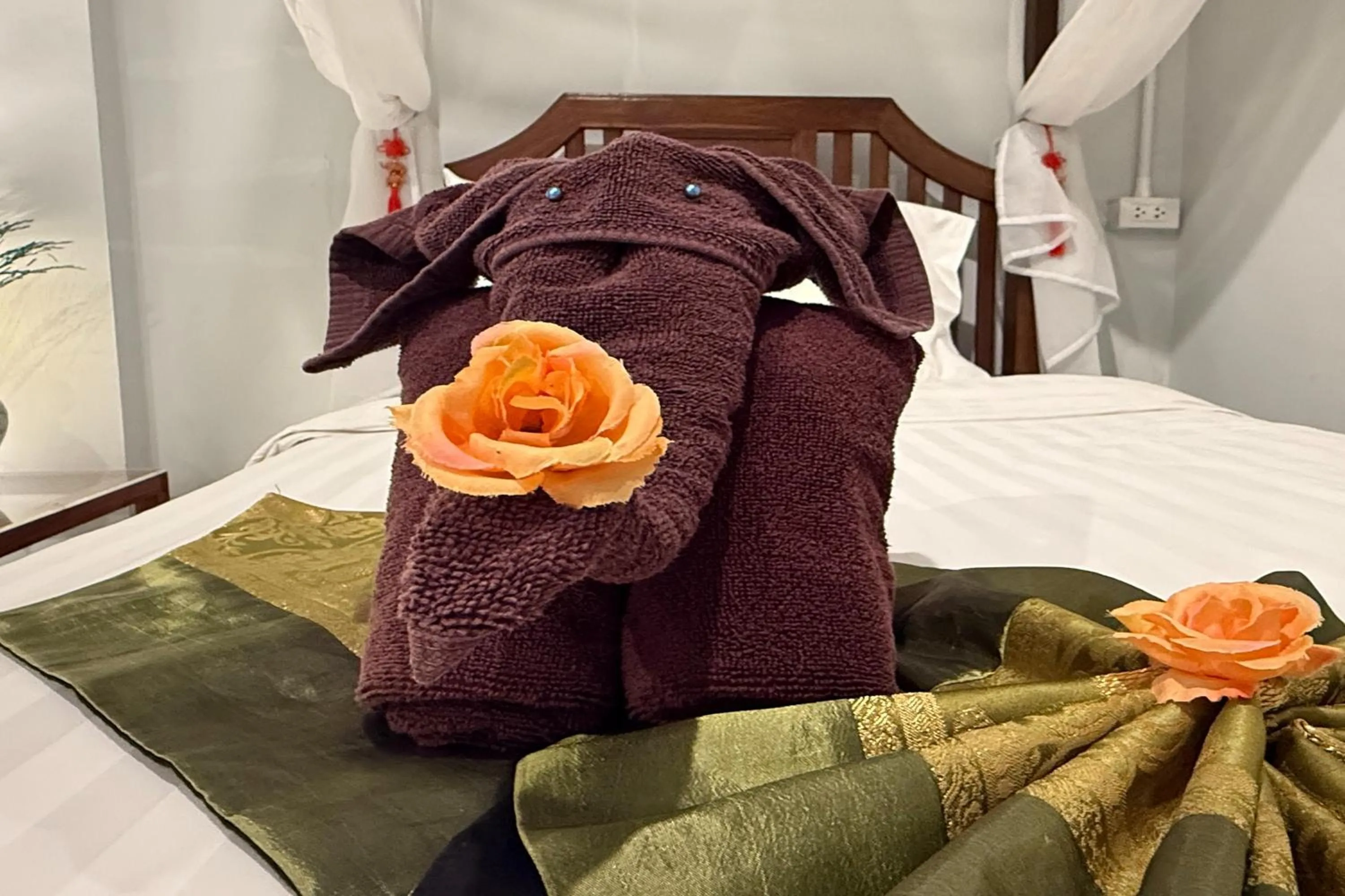 Bed in Sabaidee Chiangmai Hotel