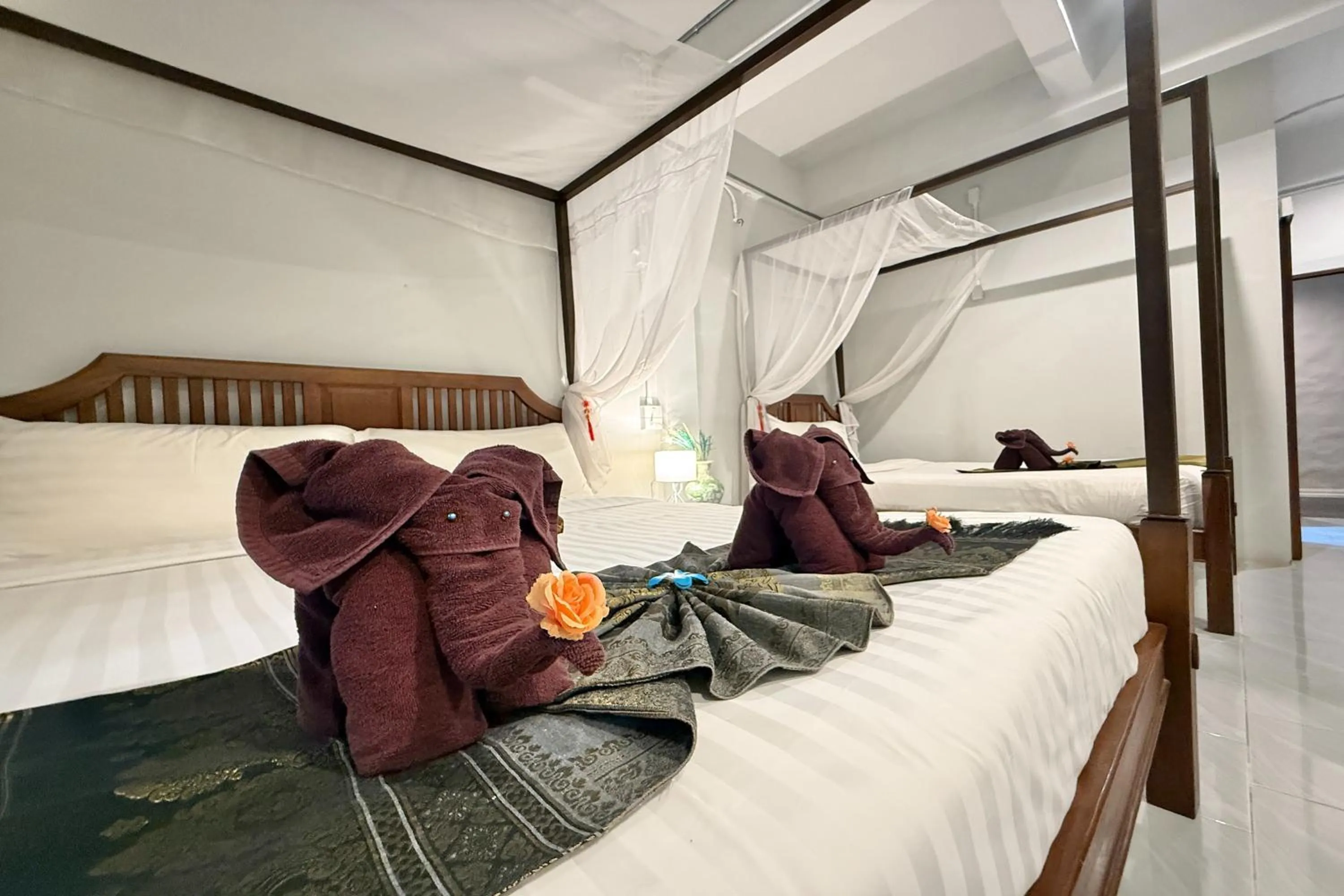 Bed in Sabaidee Chiangmai Hotel