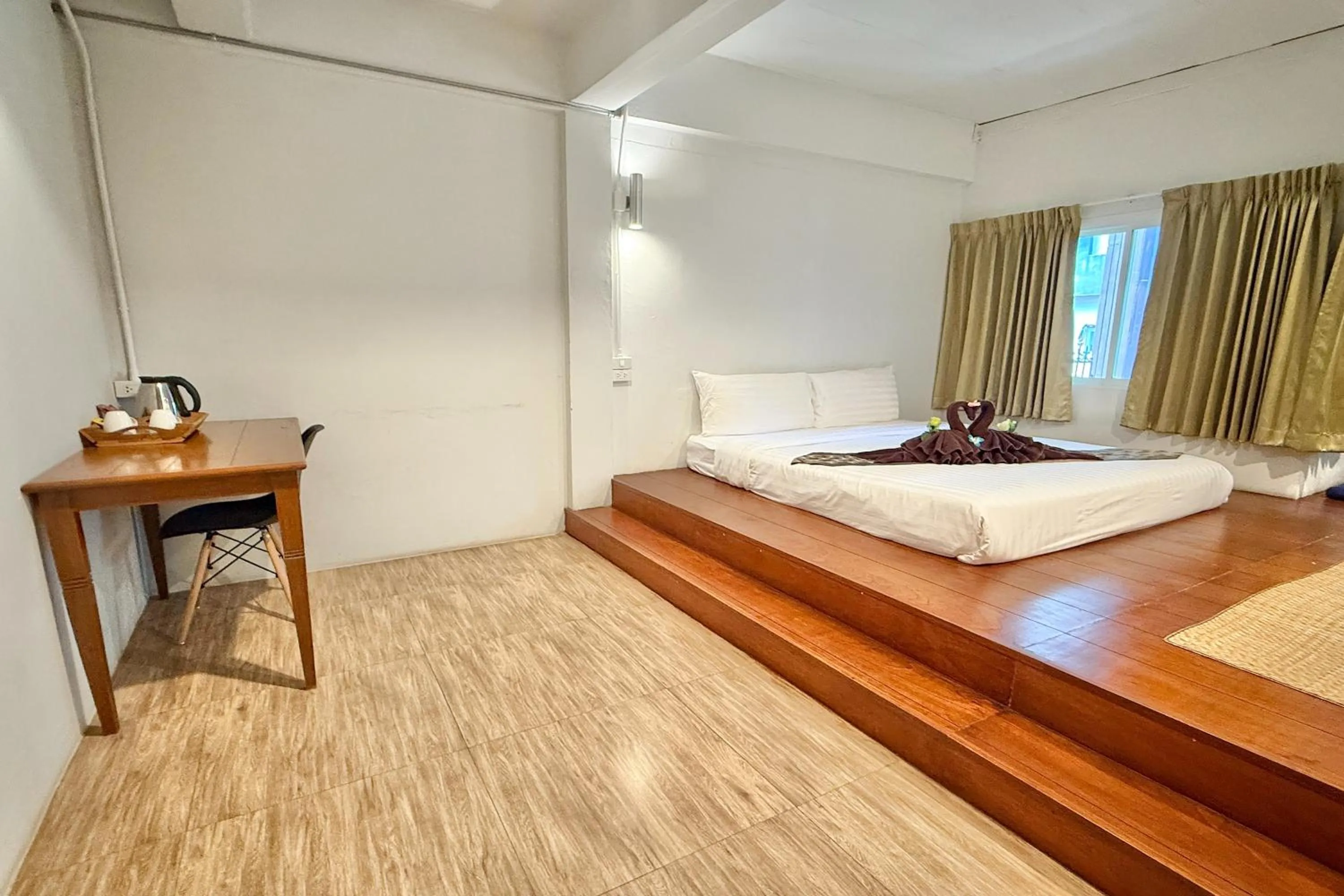 Bed in Sabaidee Chiangmai Hotel