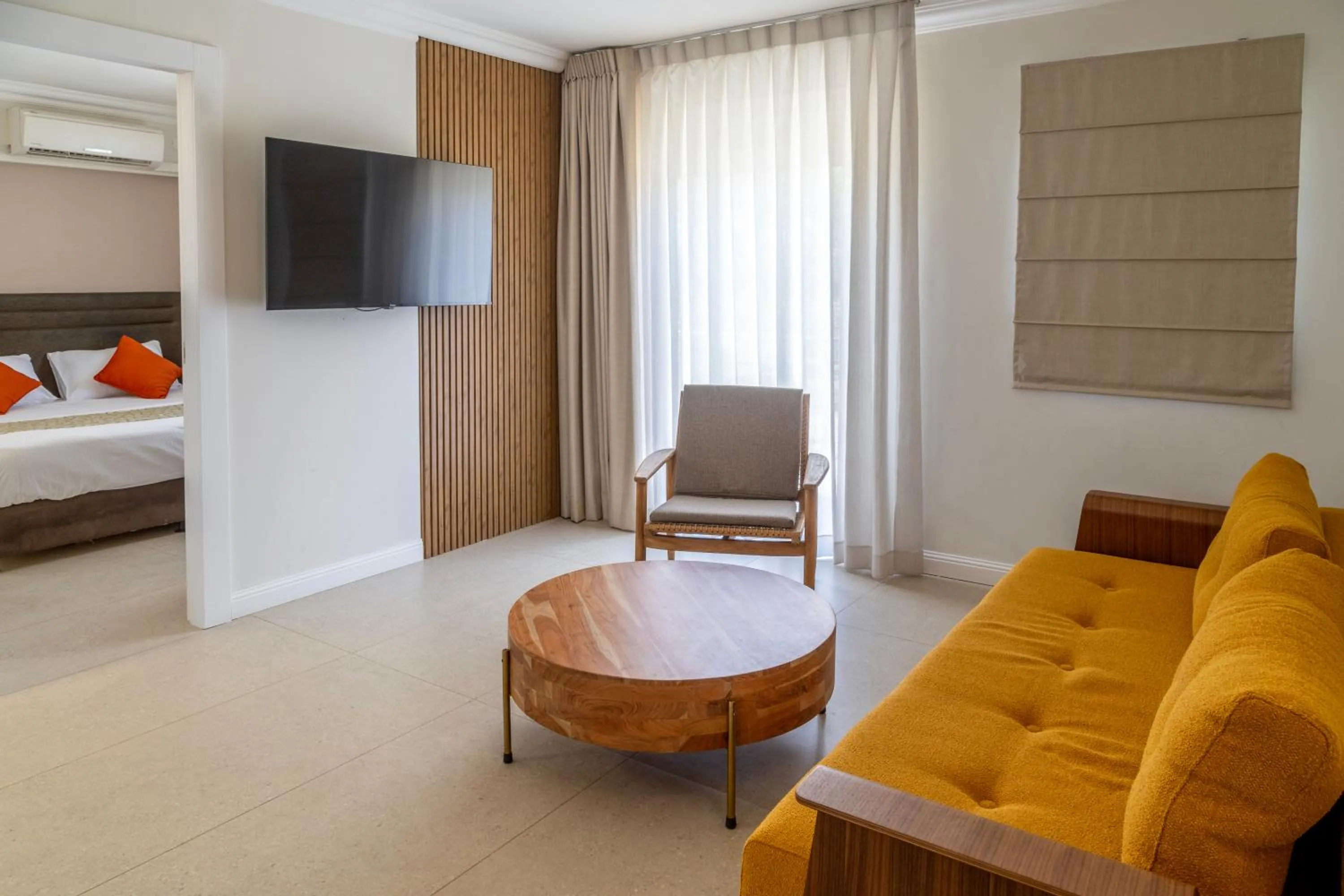 Living room, Bed in Ramon Suites by Smart Hotels
