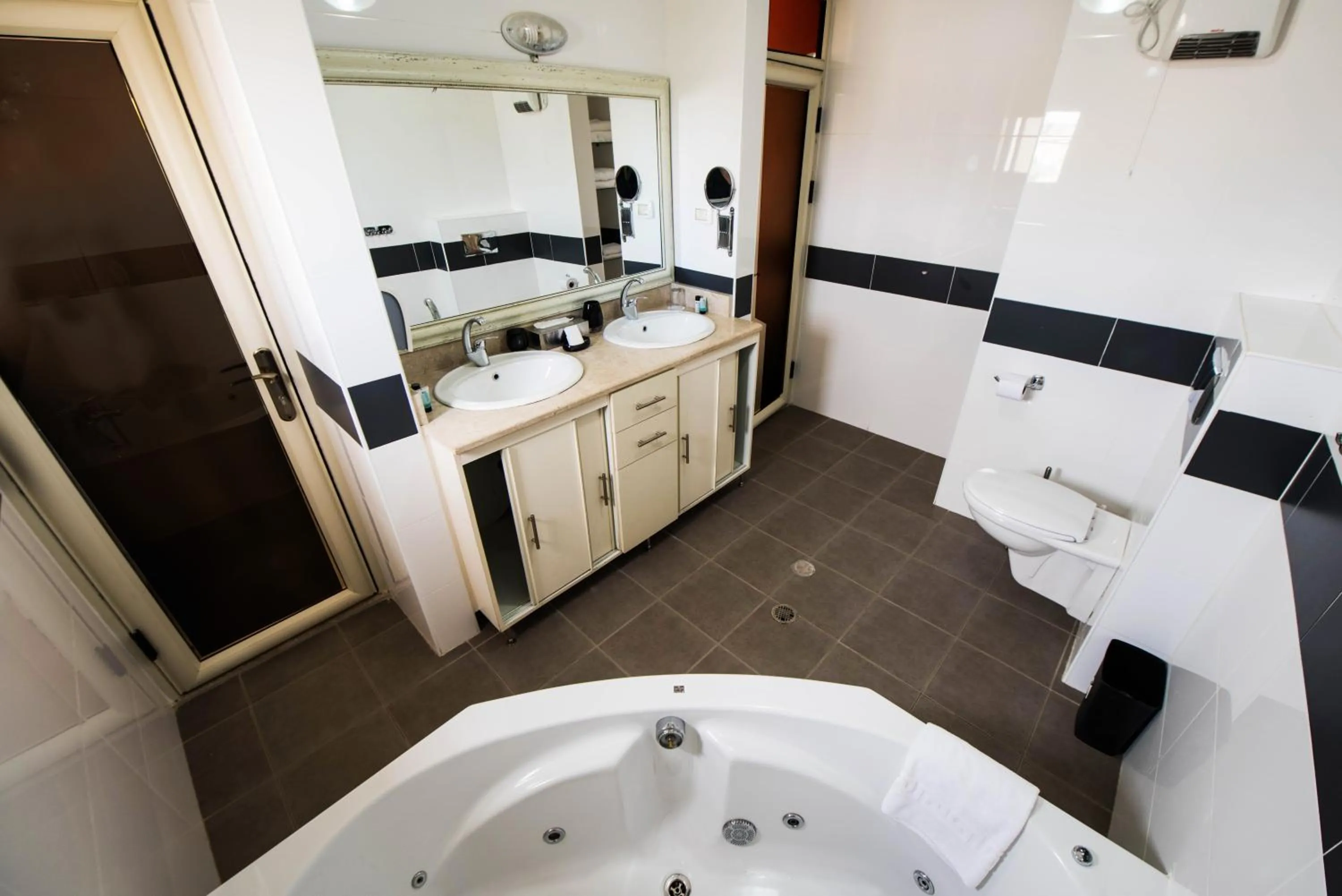 Bed in Ramon Suites by Smart Hotels