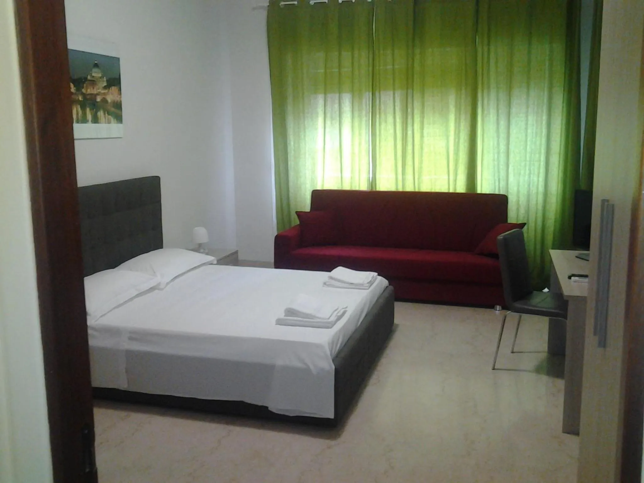 Bed in Olimpica Relais guest house