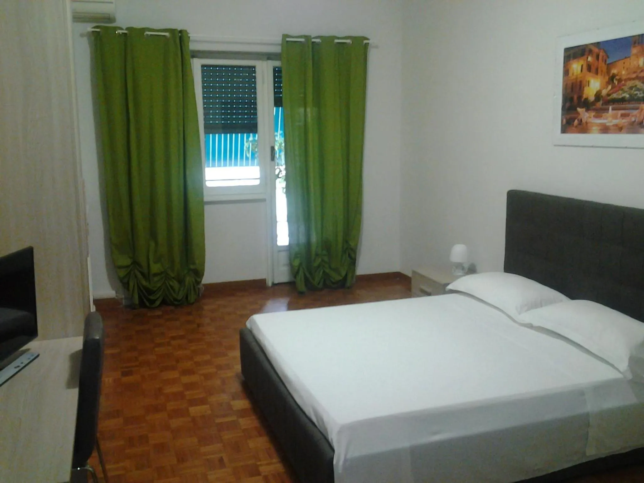 Bed in Olimpica Relais guest house