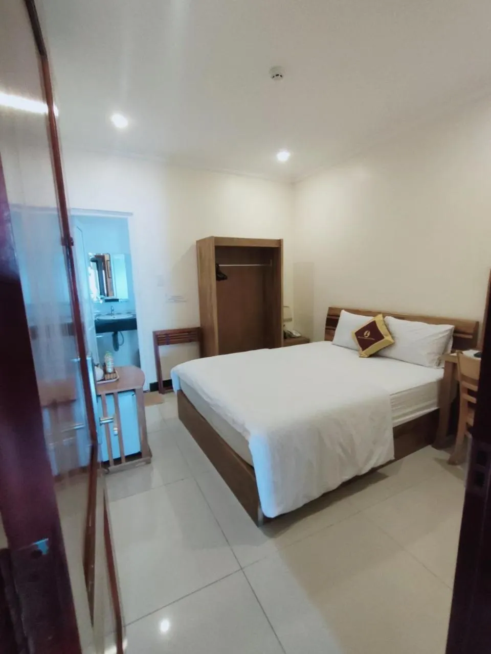 Bed in Kim Huong Quang Hotel