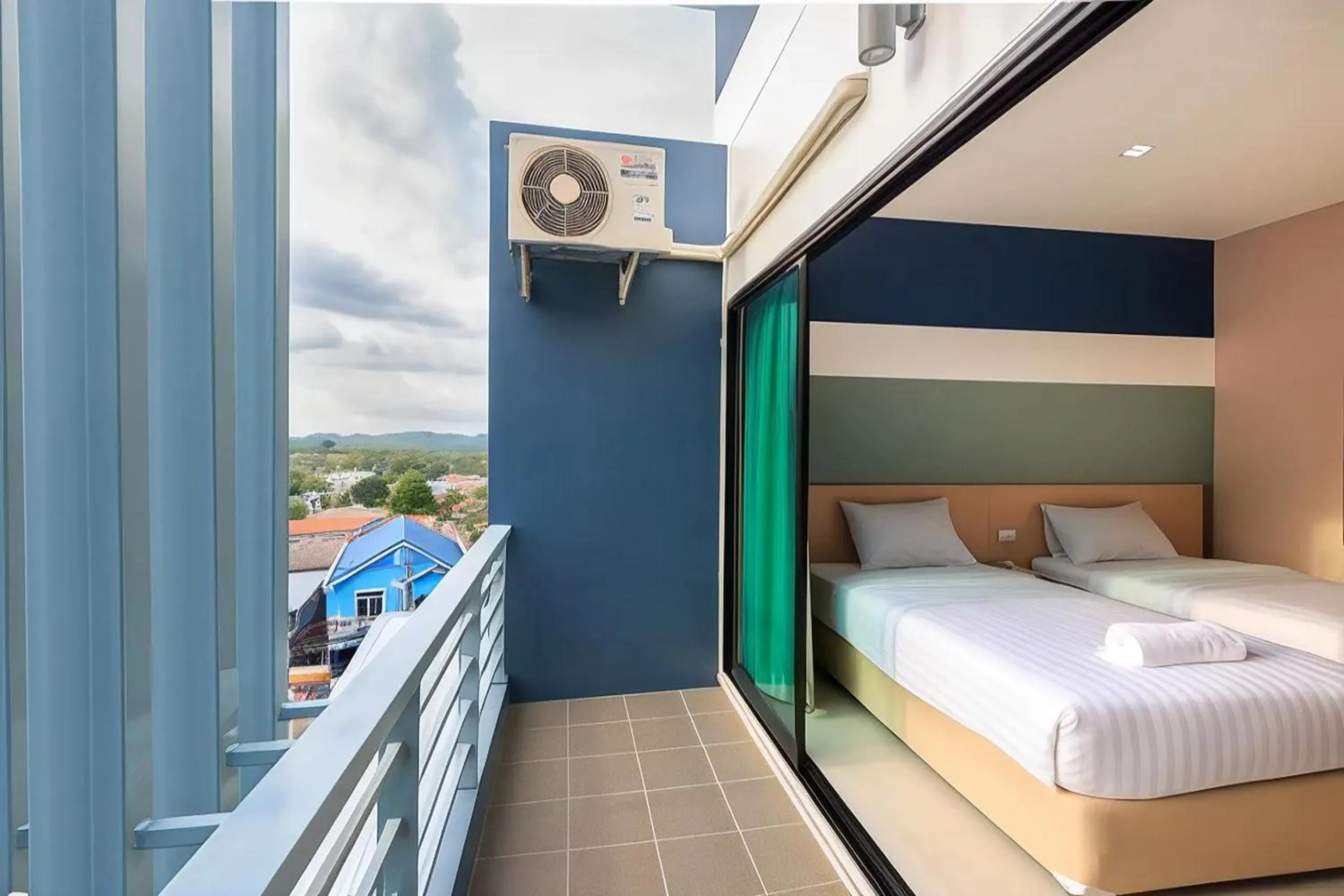 Balcony/Terrace, Bed in JJ Residence Phuket Town