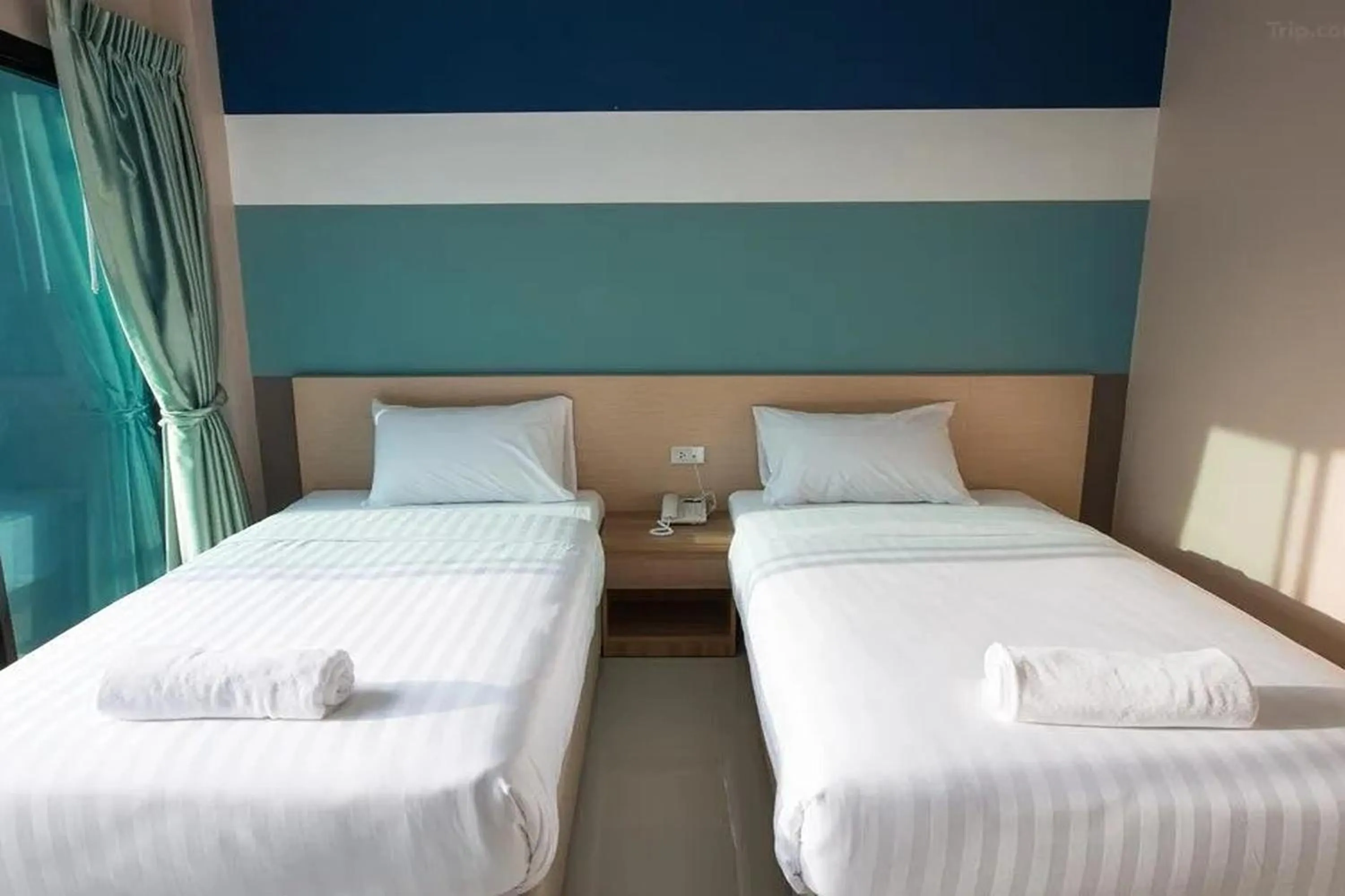 Bed in JJ Residence Phuket Town