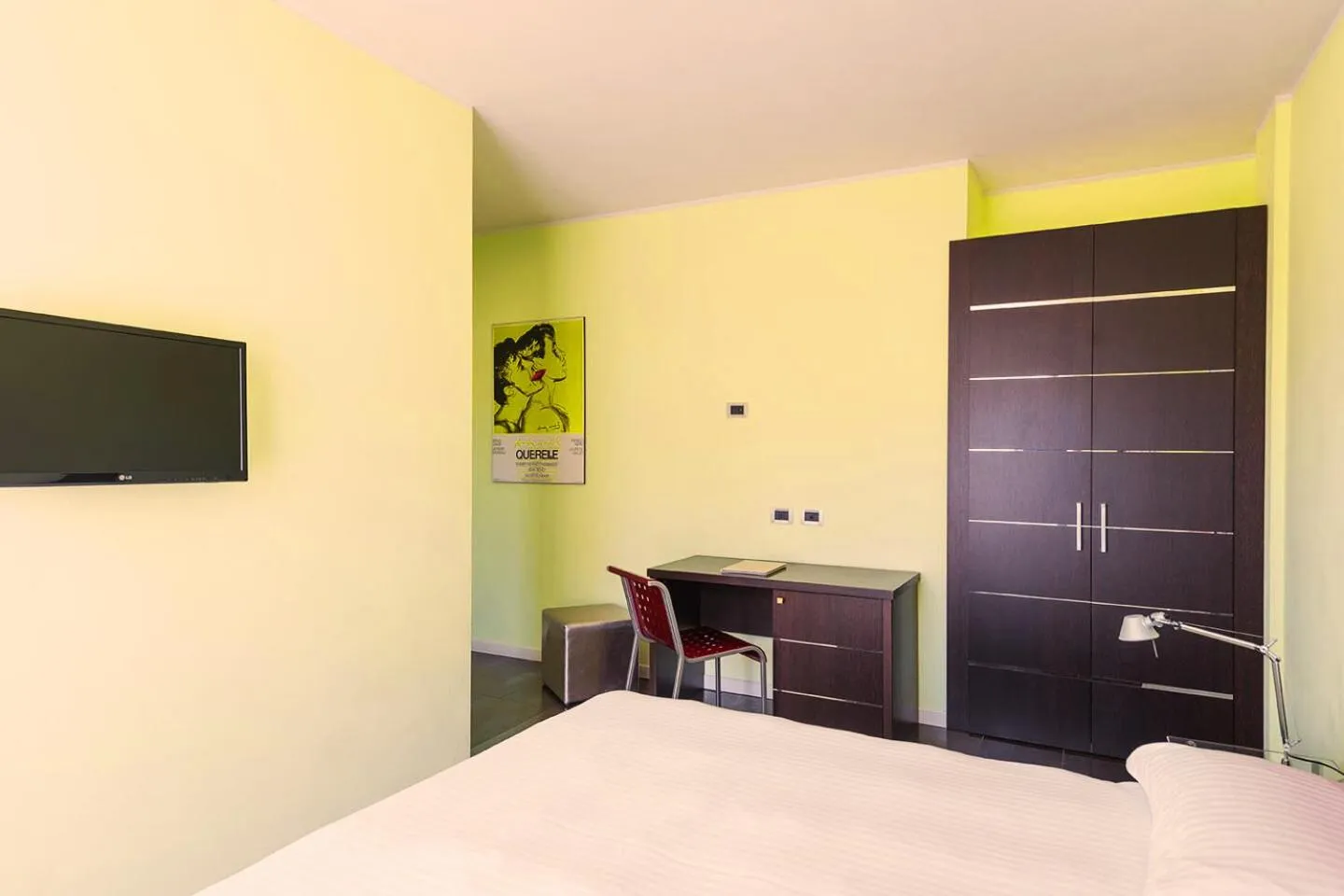 Bed in T'AMI Hotel Resort Spa