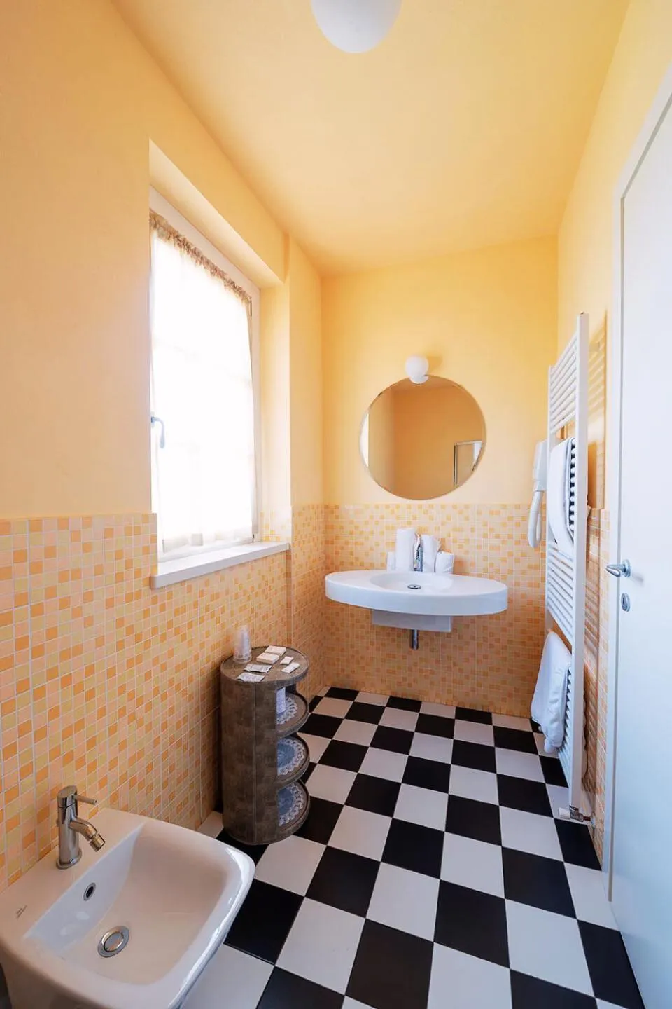 Toilet in T'AMI Hotel Resort Spa