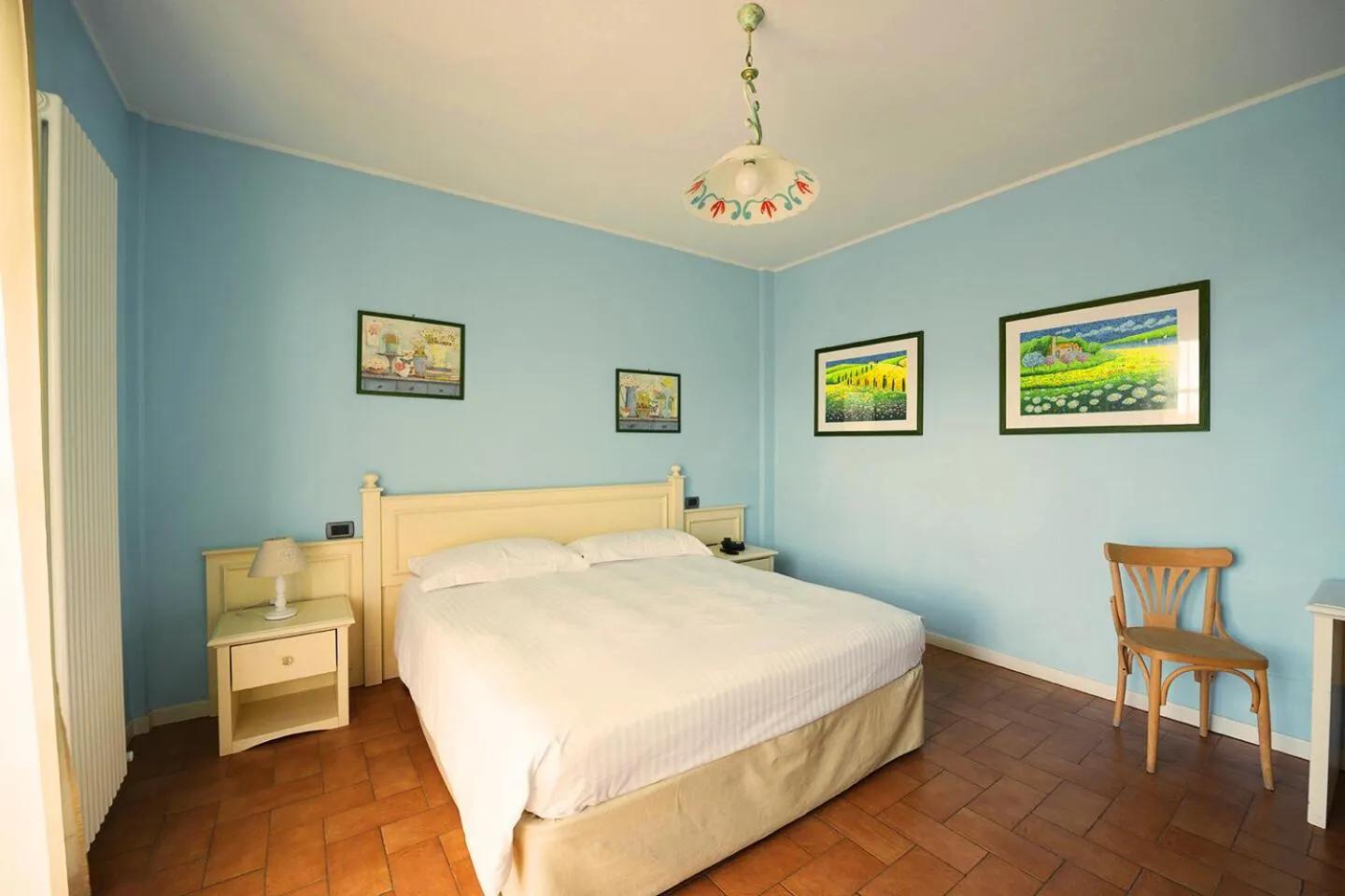 Bed in T'AMI Hotel Resort Spa