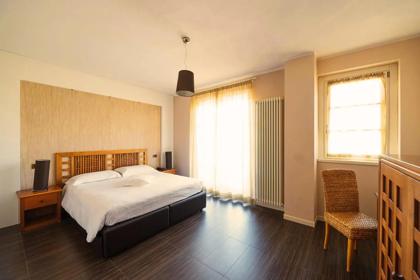 Bed in T'AMI Hotel Resort Spa