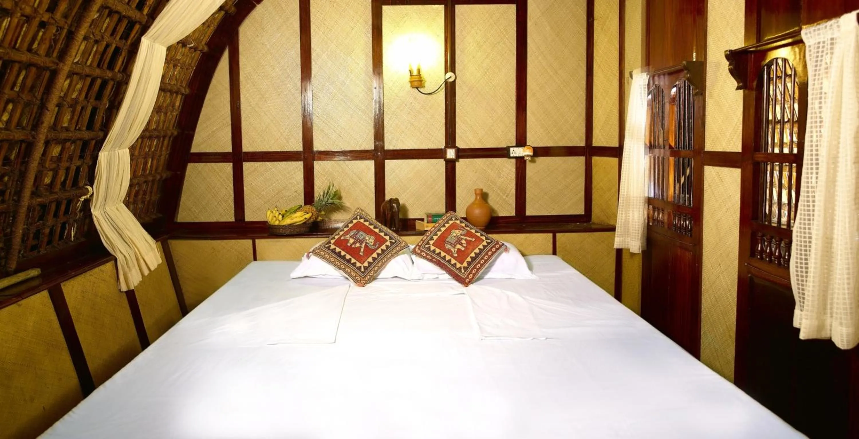 Bed in Spice Coast Cruises - Houseboat, A CGH Earth Experience