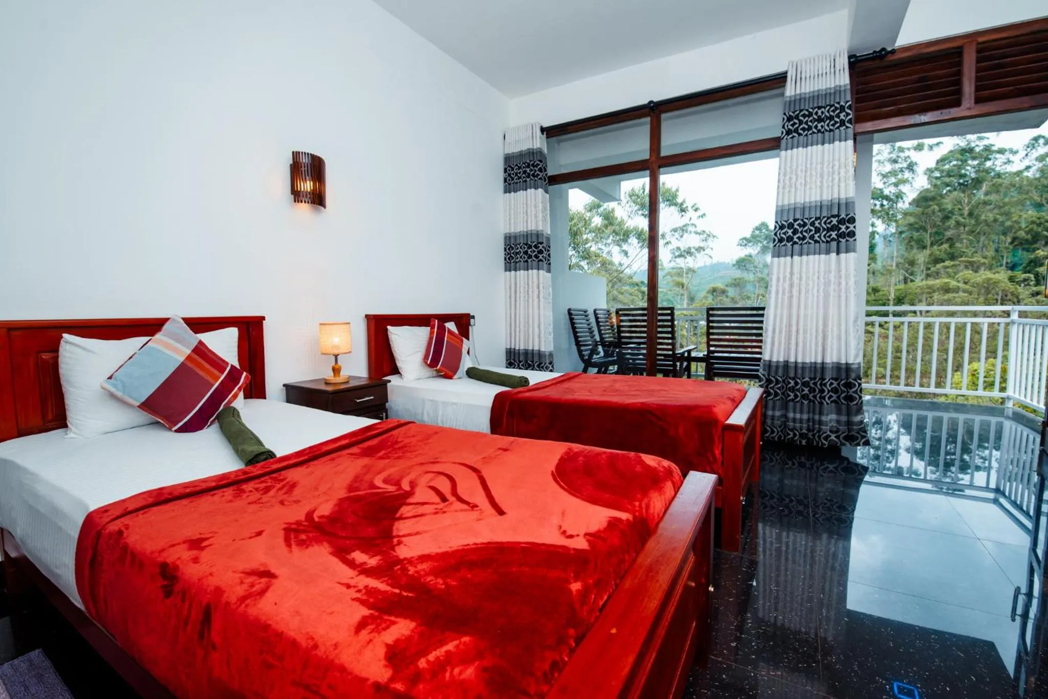Bed in Adams Peak Inn