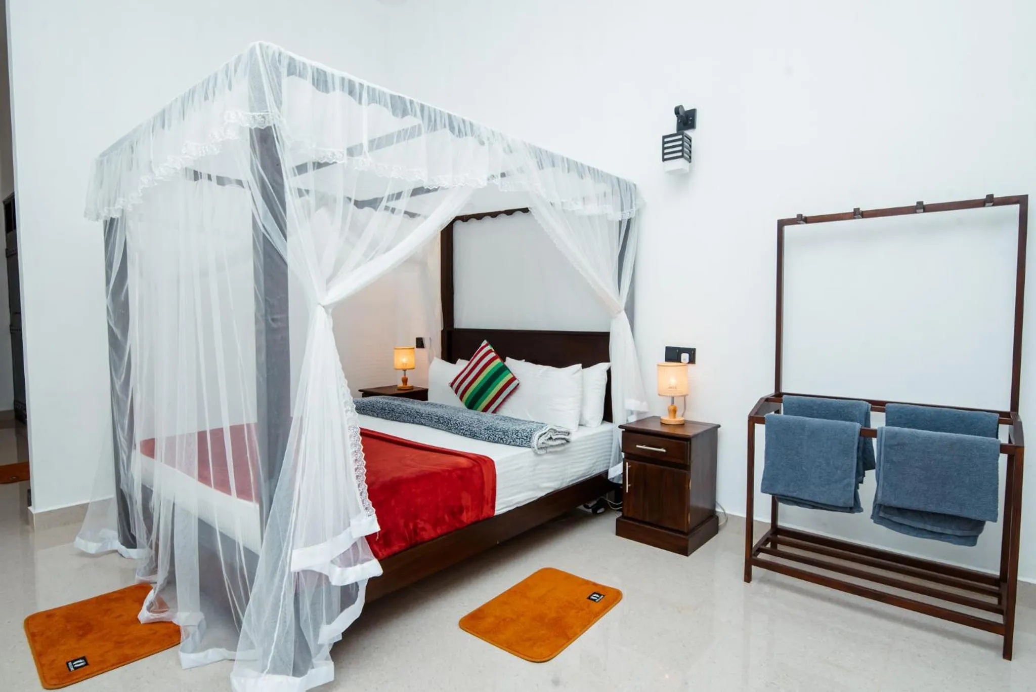 Bed in Adams Peak Inn