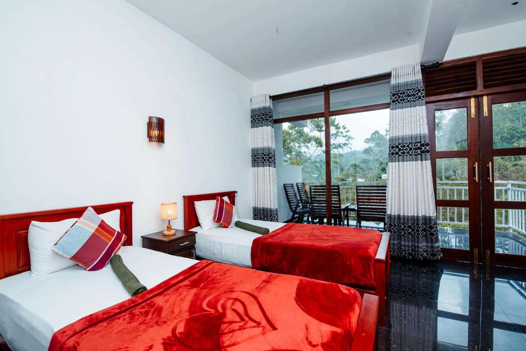 Bed in Adams Peak Inn