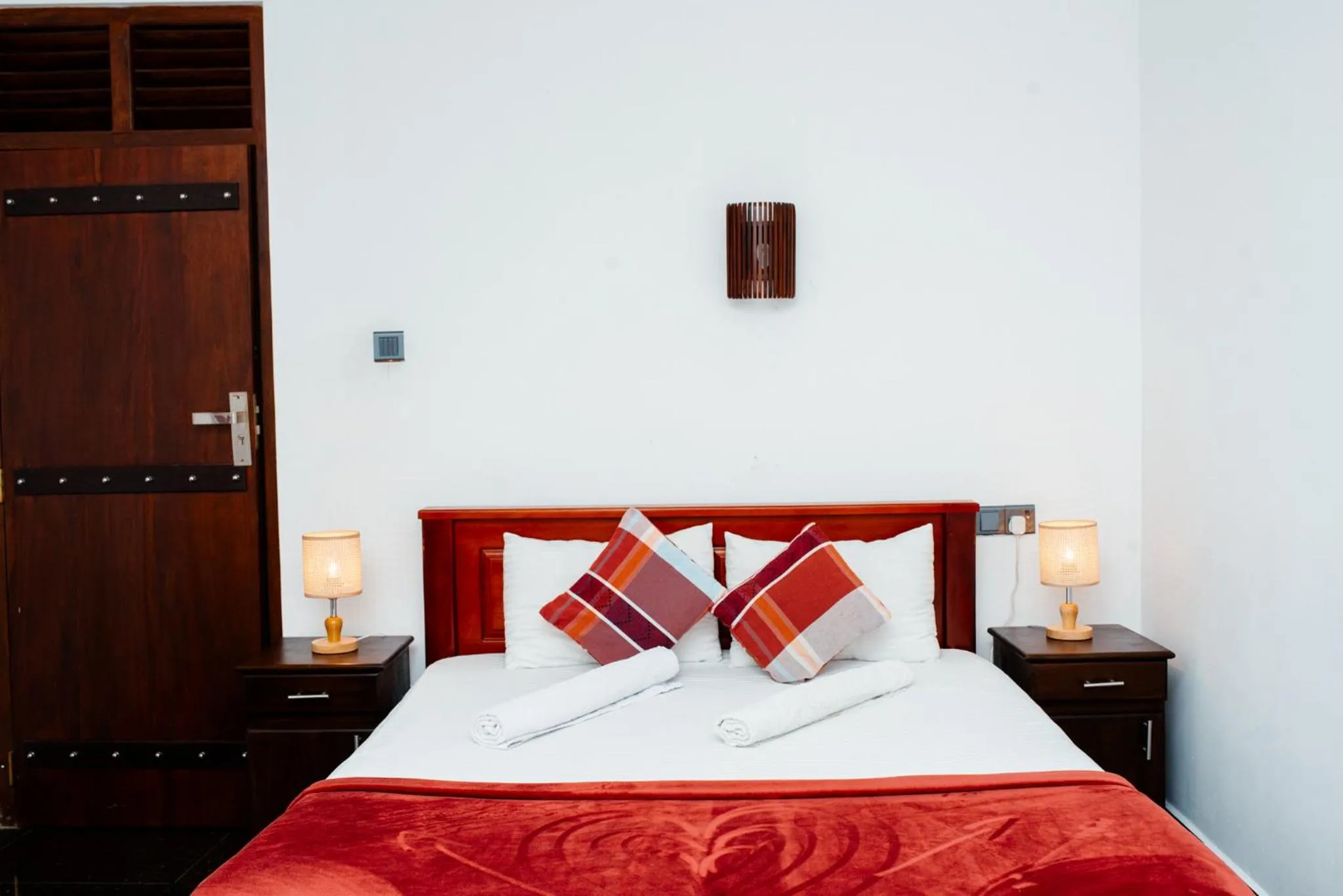 Bed in Adams Peak Inn