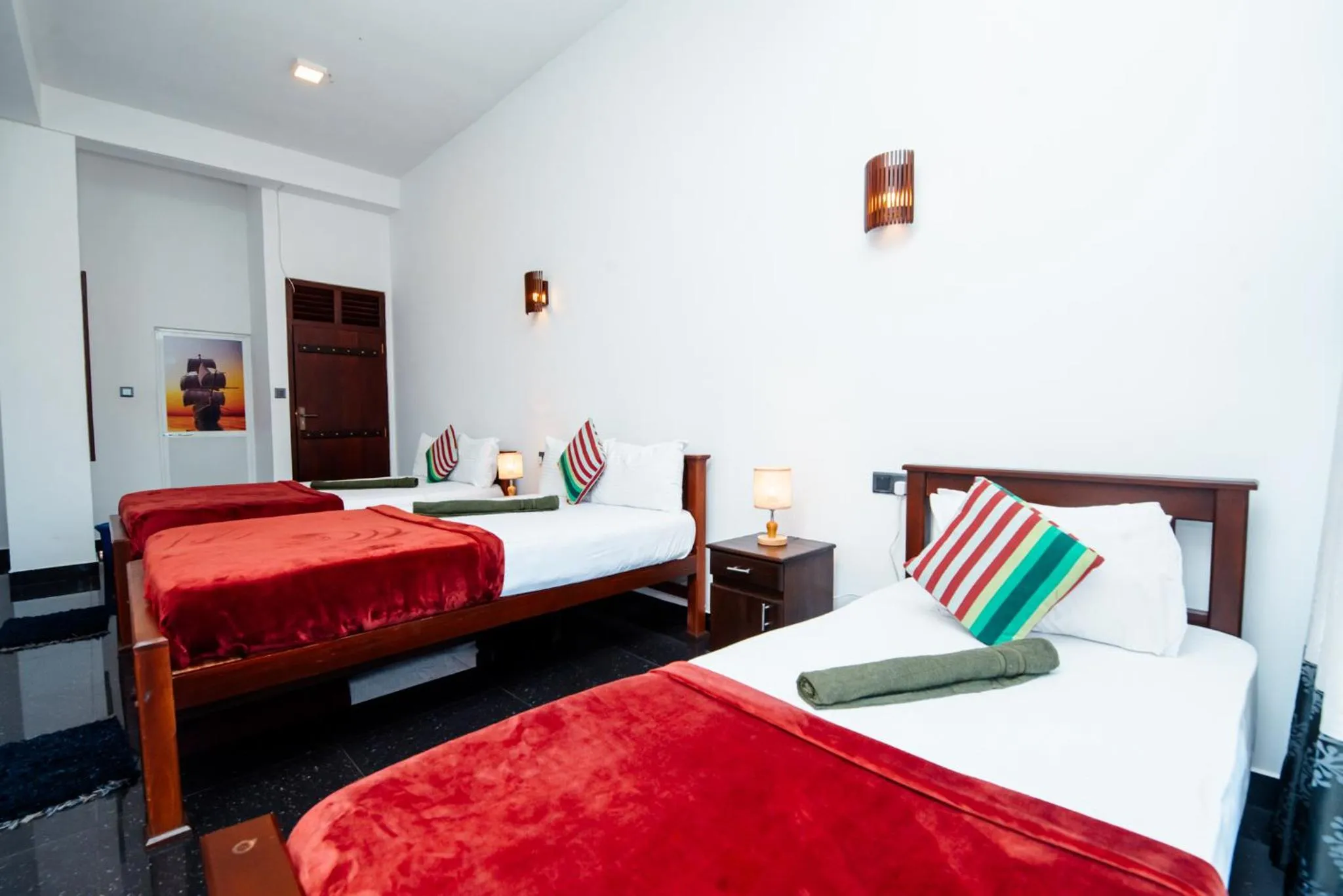 Bed in Adams Peak Inn