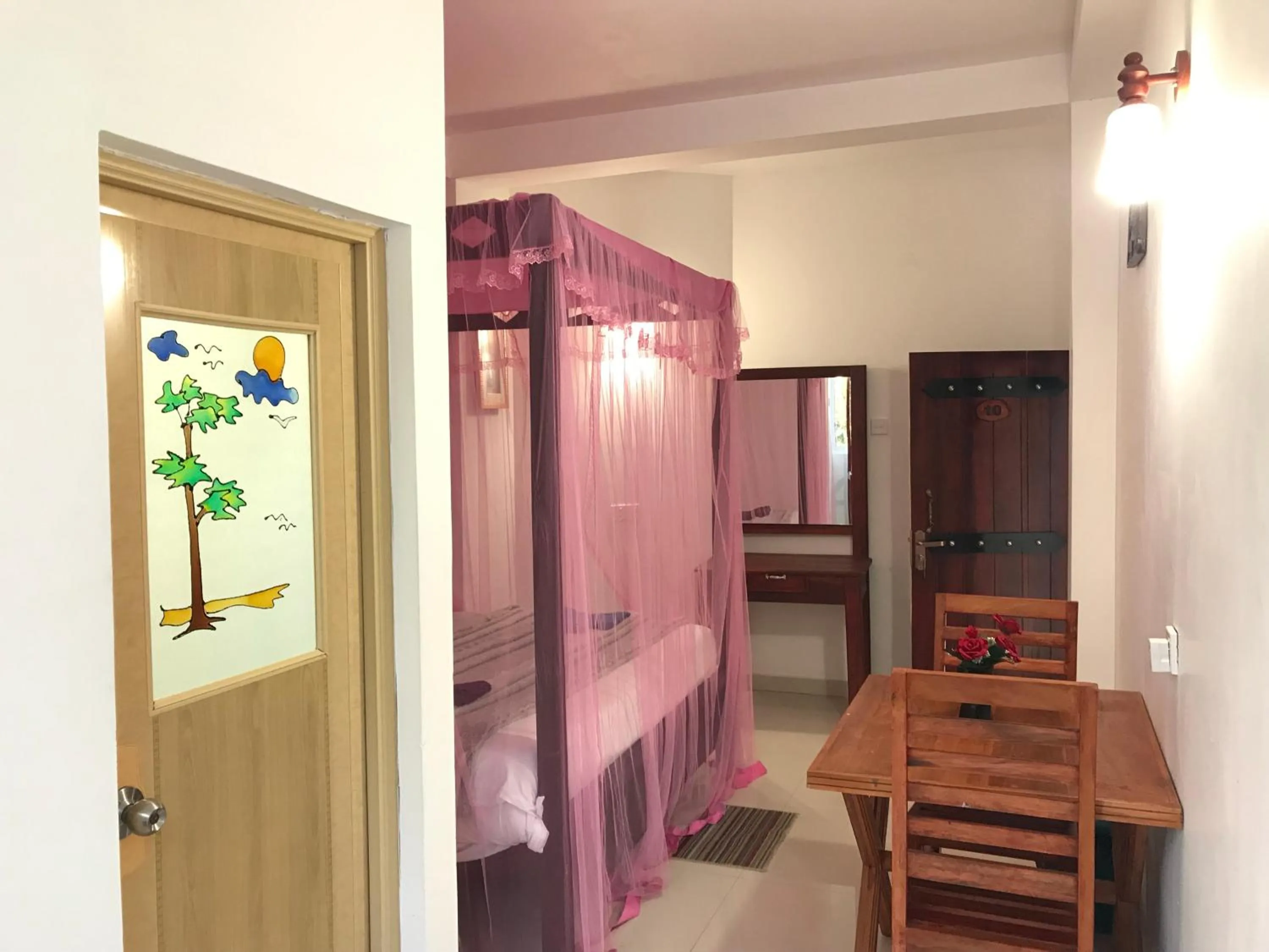 Bed in Adams Peak Inn