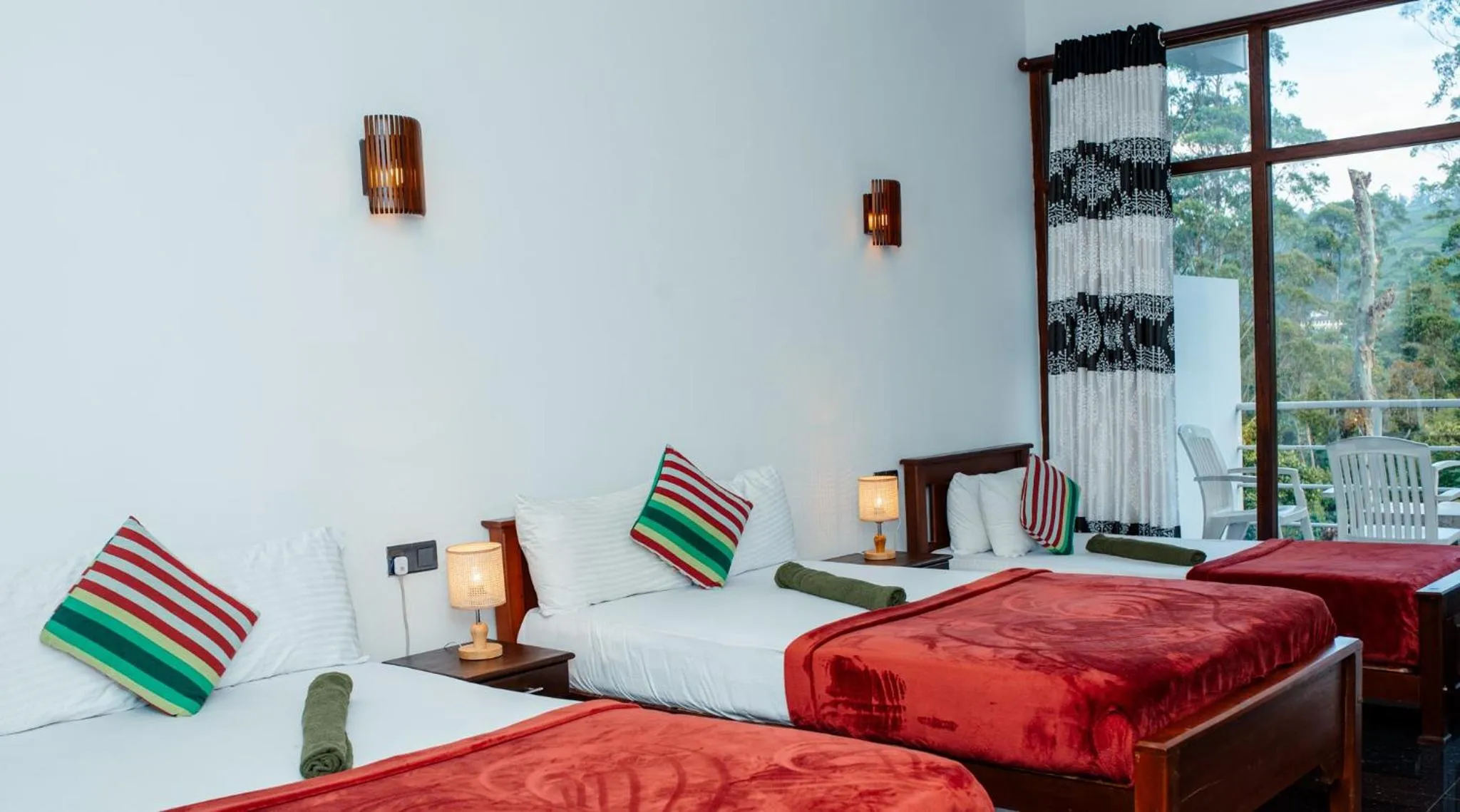 Bed in Adams Peak Inn