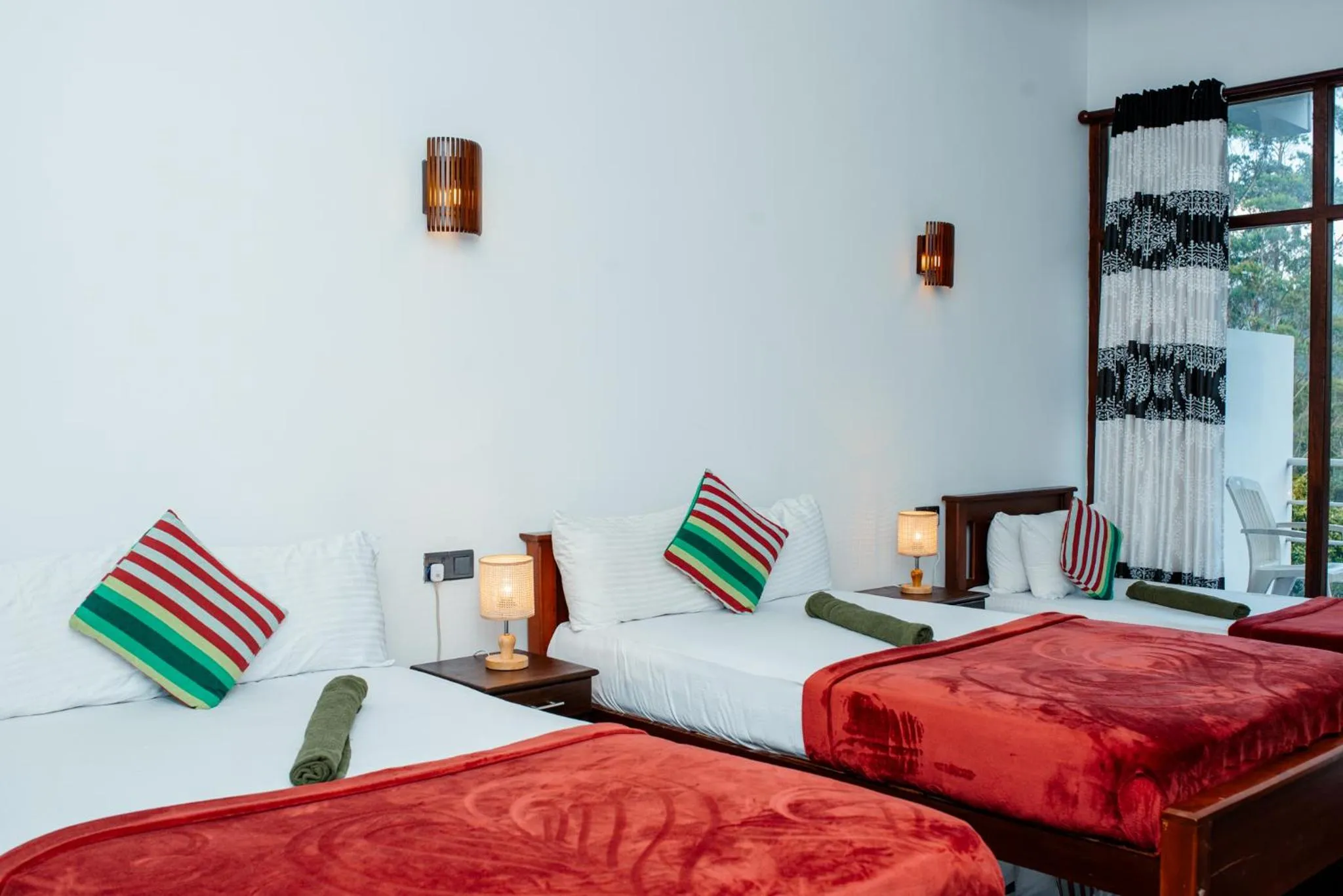 Bed in Adams Peak Inn