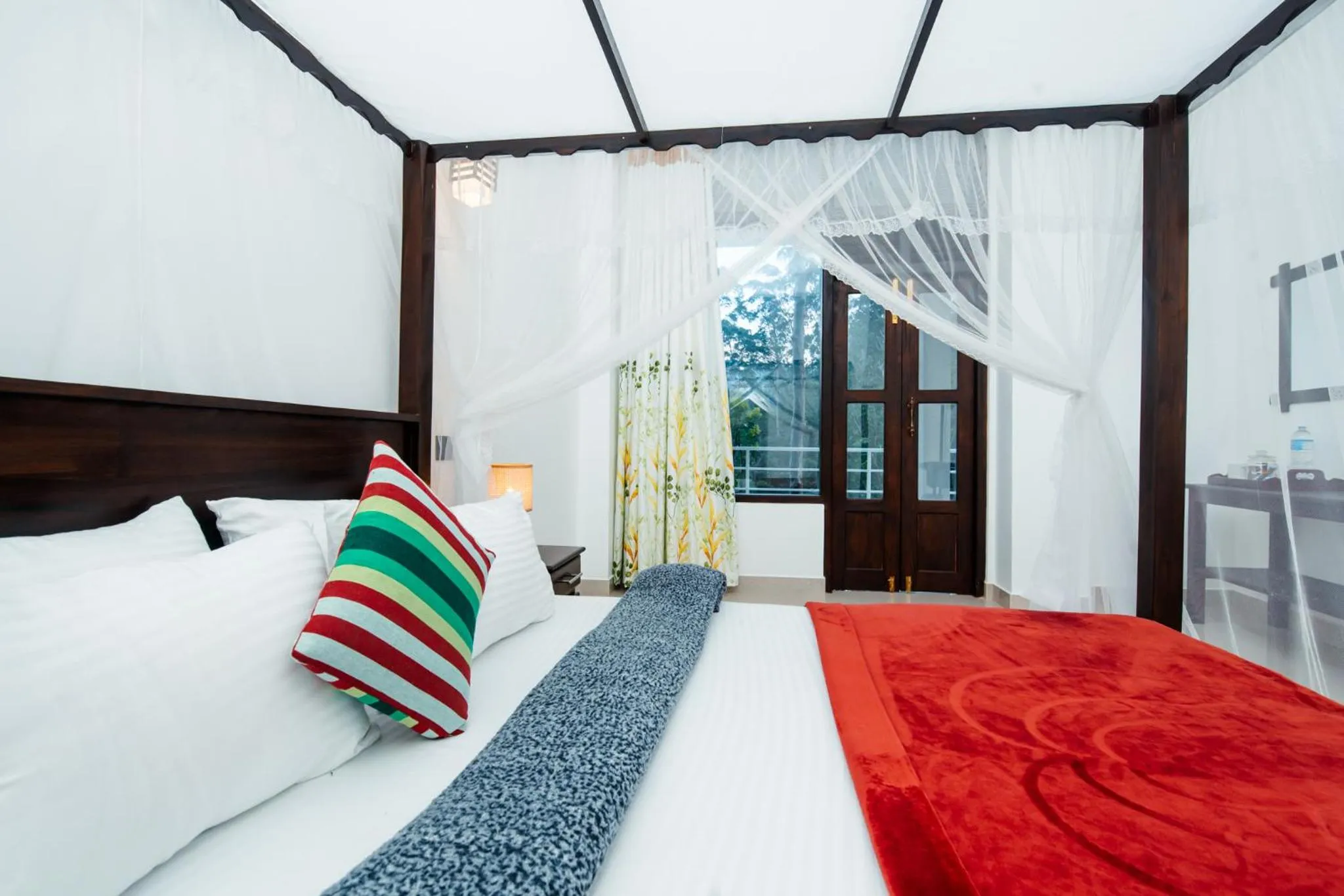 Bed in Adams Peak Inn