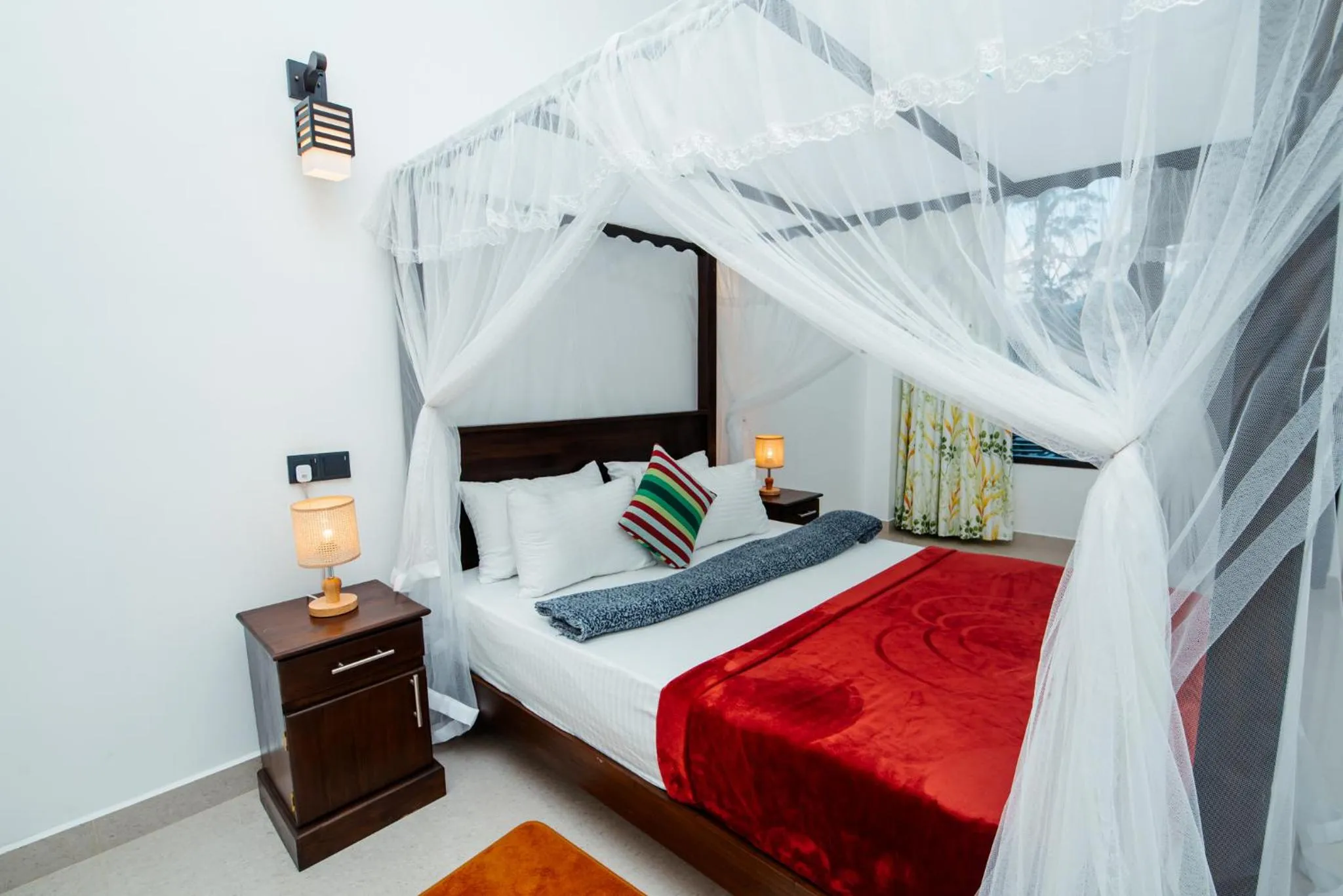 Bed in Adams Peak Inn