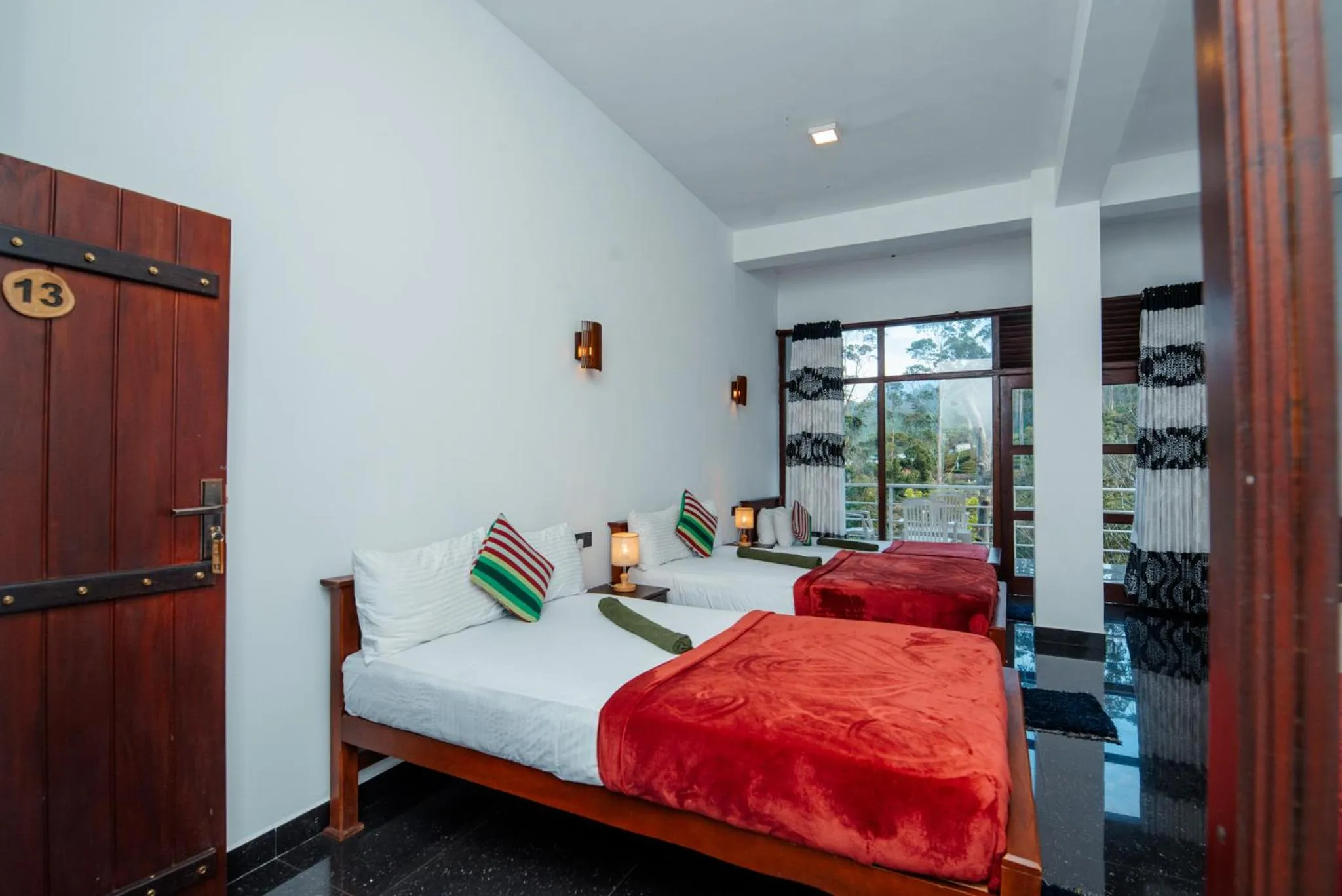 Bed in Adams Peak Inn