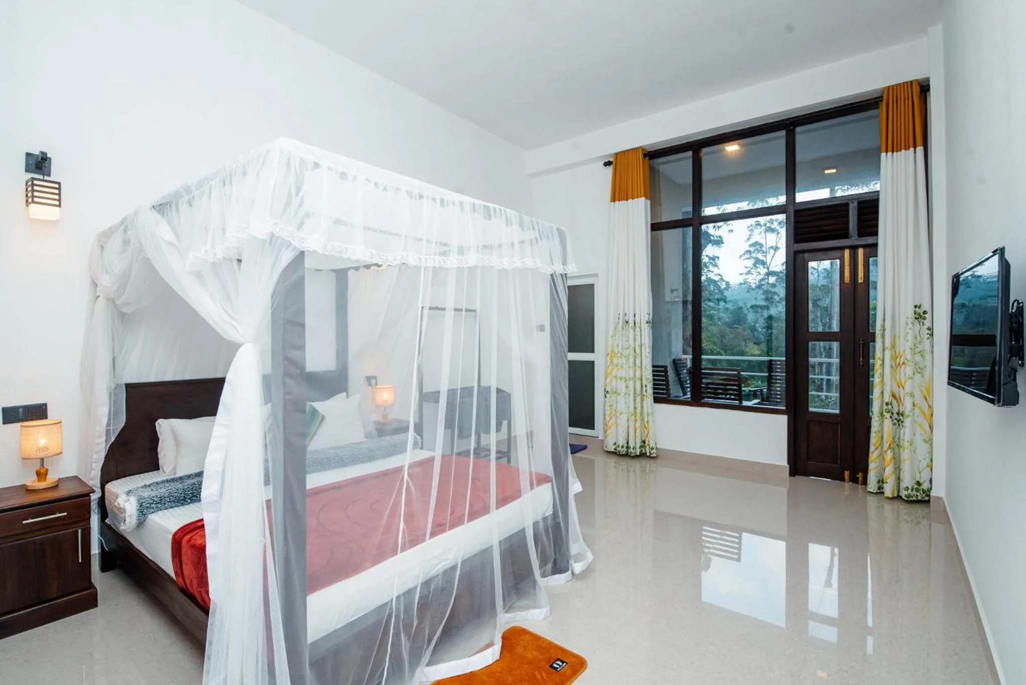 Bed in Adams Peak Inn