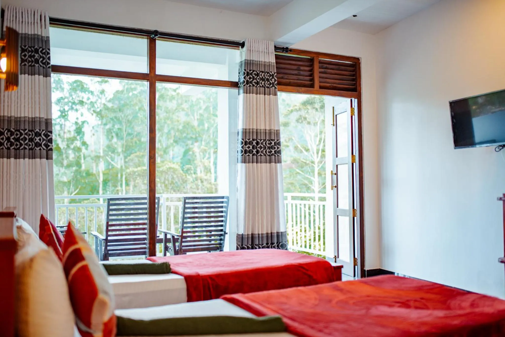 Bed in Adams Peak Inn