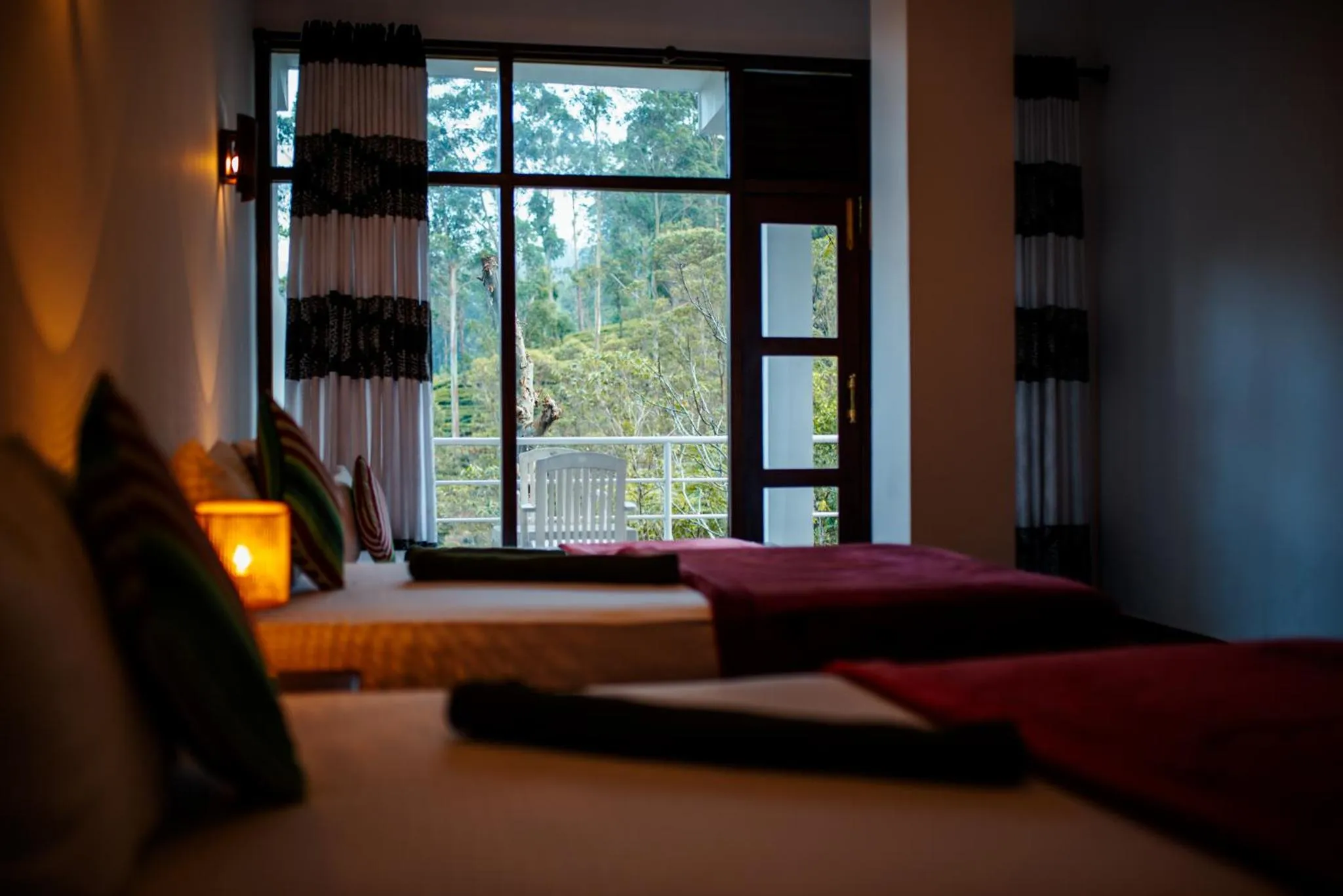 Bed in Adams Peak Inn