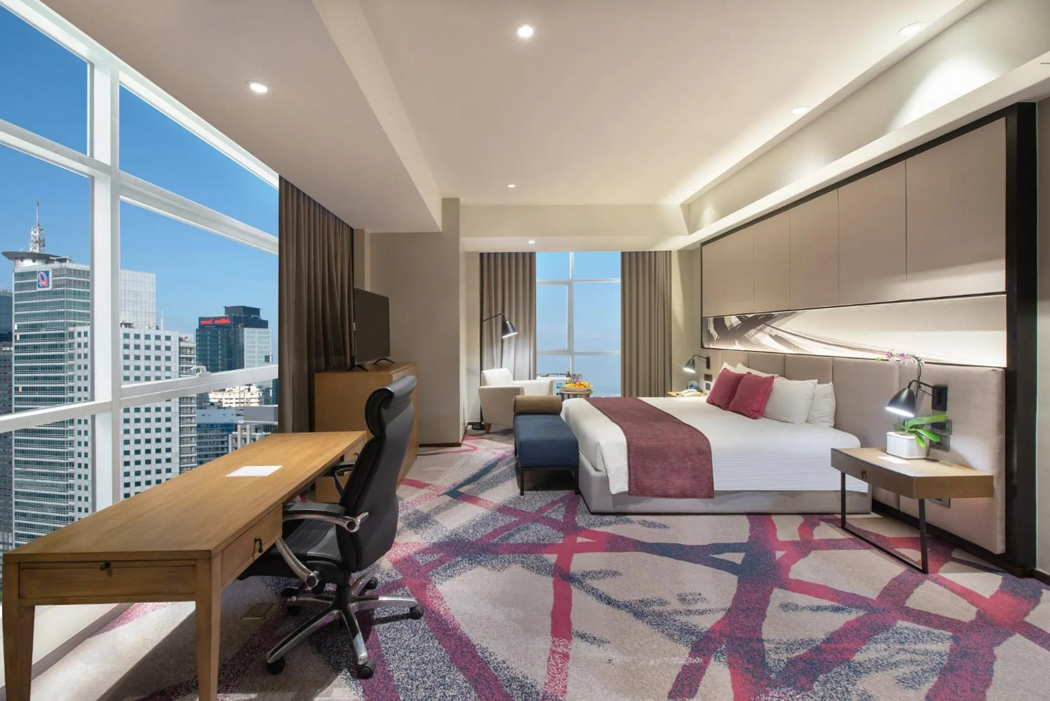 Photo of the whole room, Bed in Crowne Plaza Manila Galleria by IHG