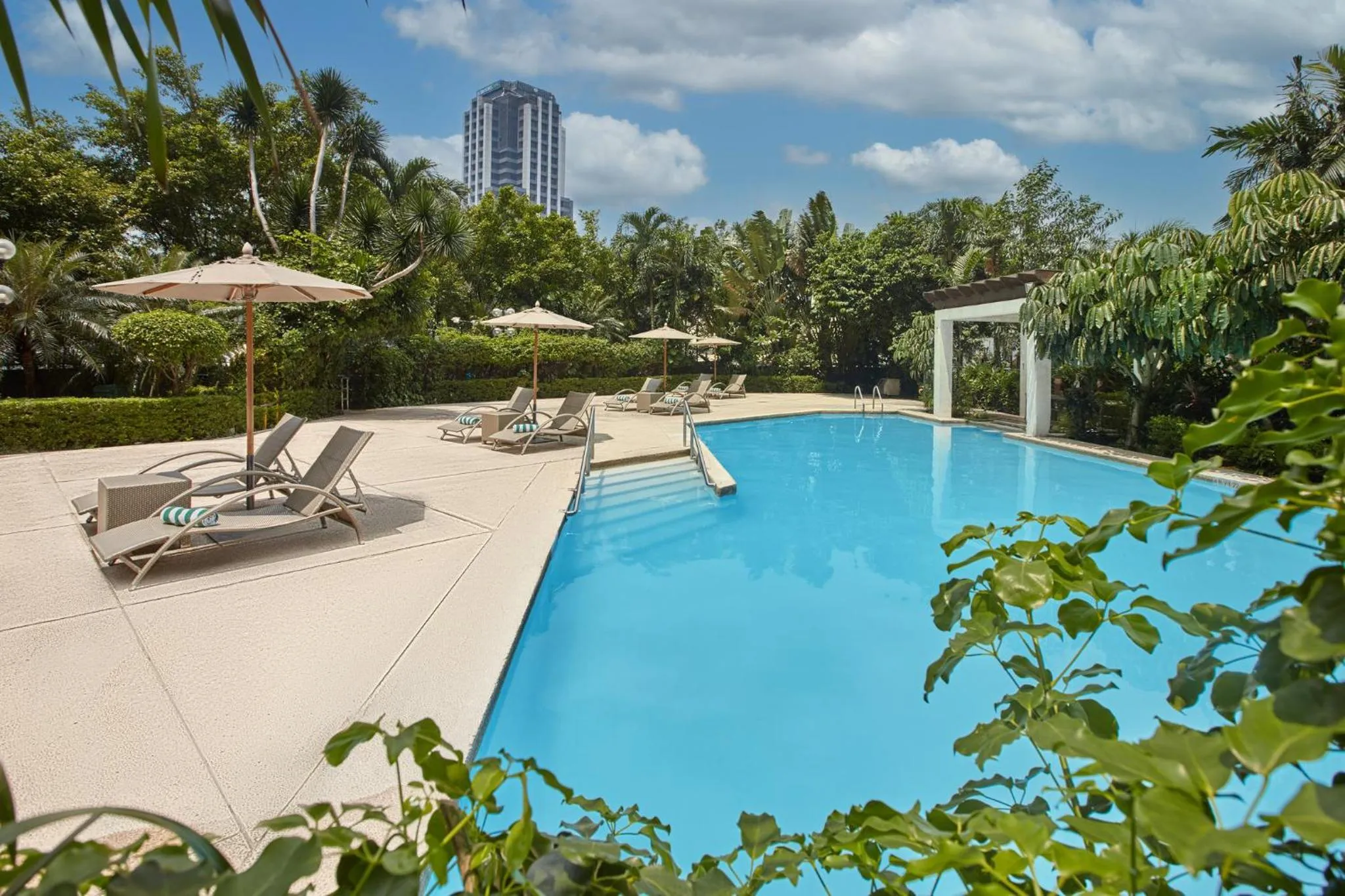 Swimming pool in Crowne Plaza Manila Galleria by IHG