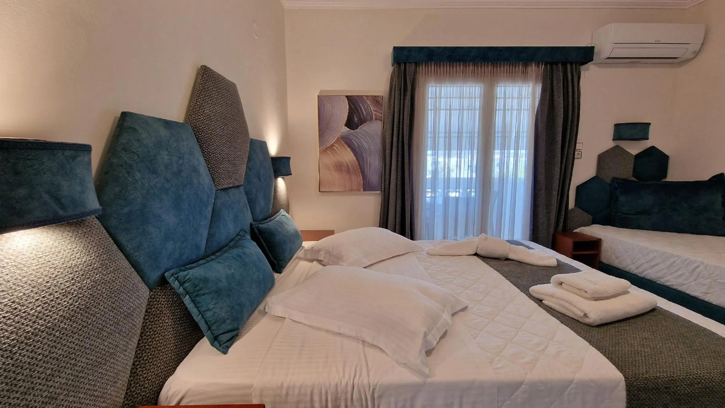 Bed in Hotel Dionysis Studios