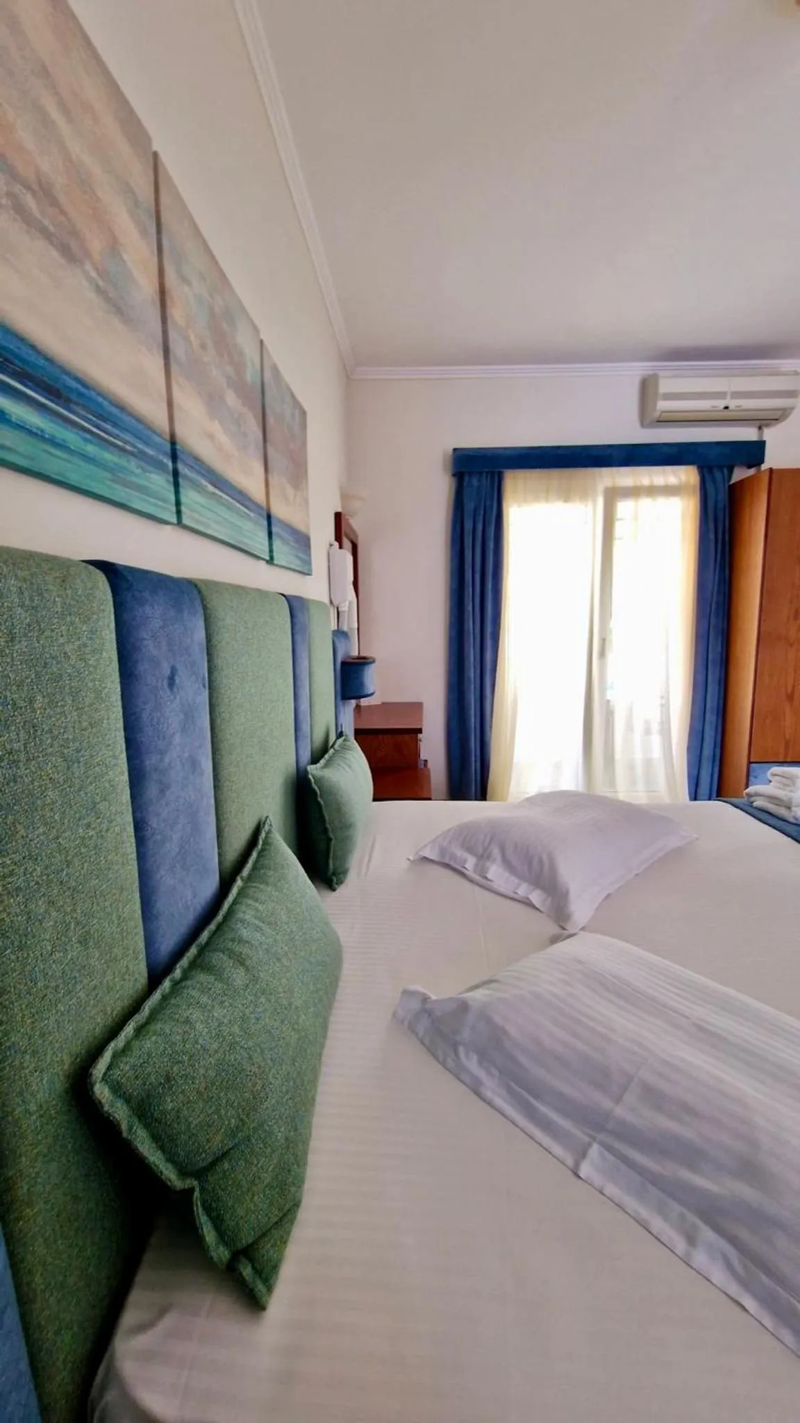 Bed in Hotel Dionysis Studios