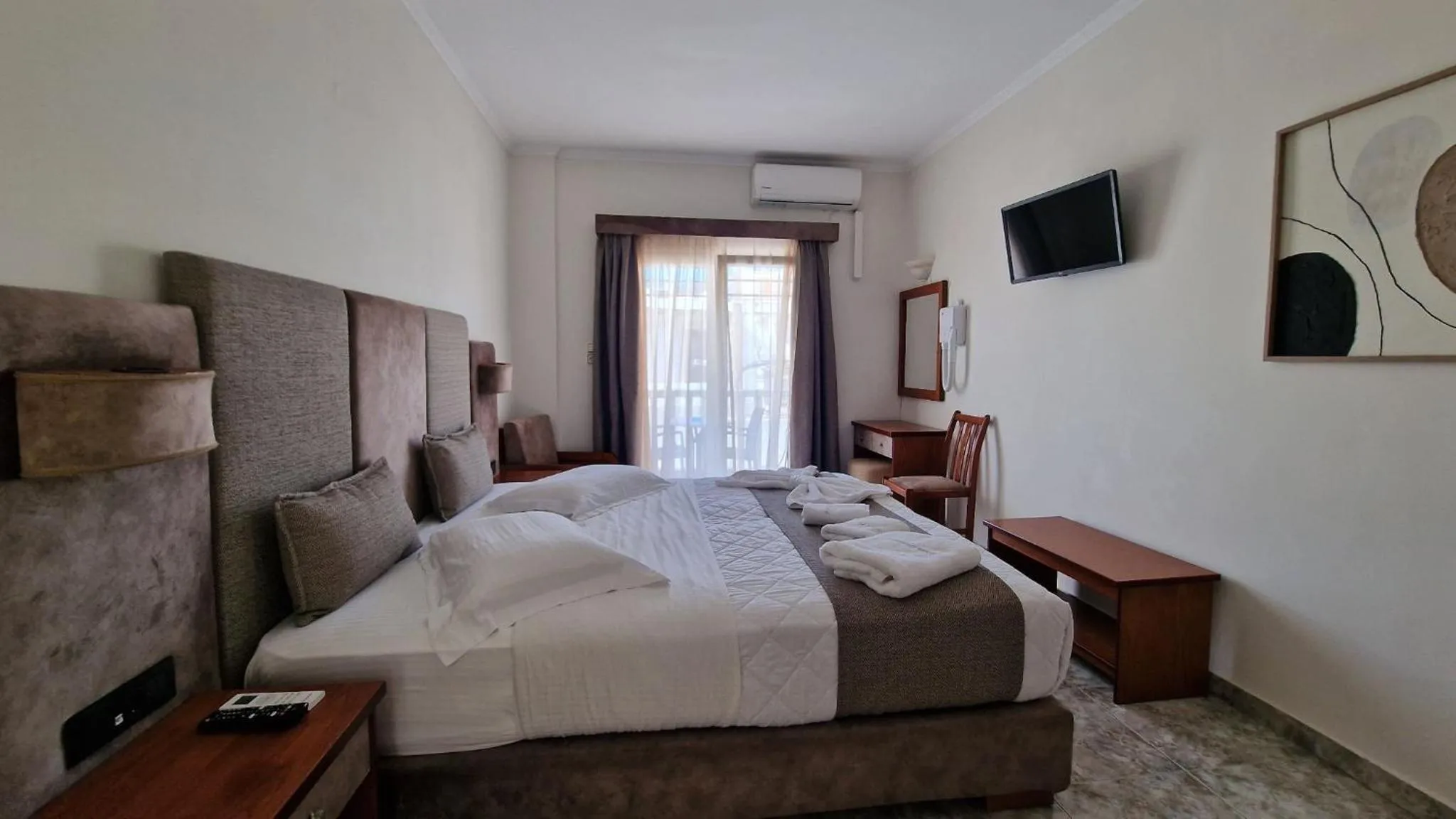 Bed in Hotel Dionysis Studios