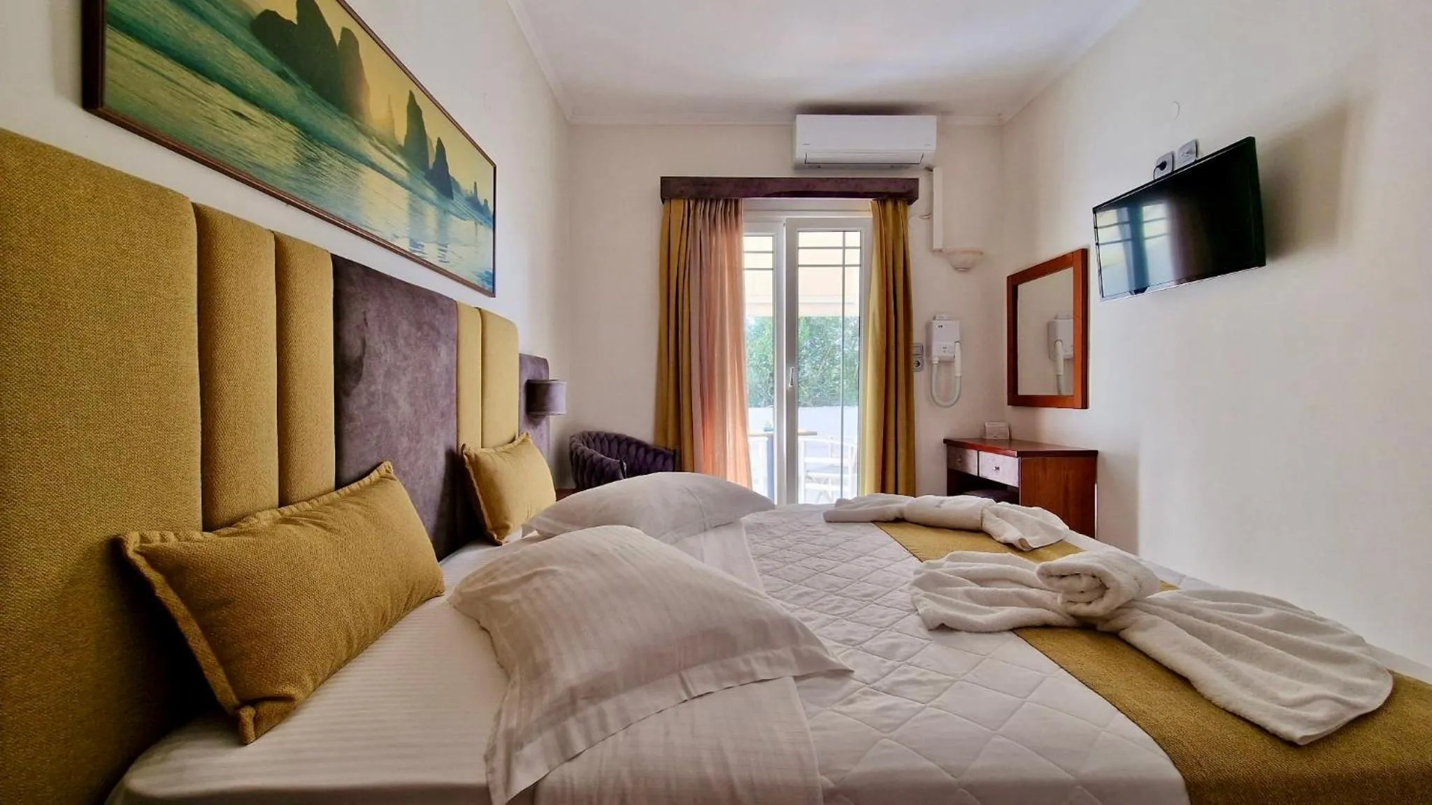 Bed in Hotel Dionysis Studios