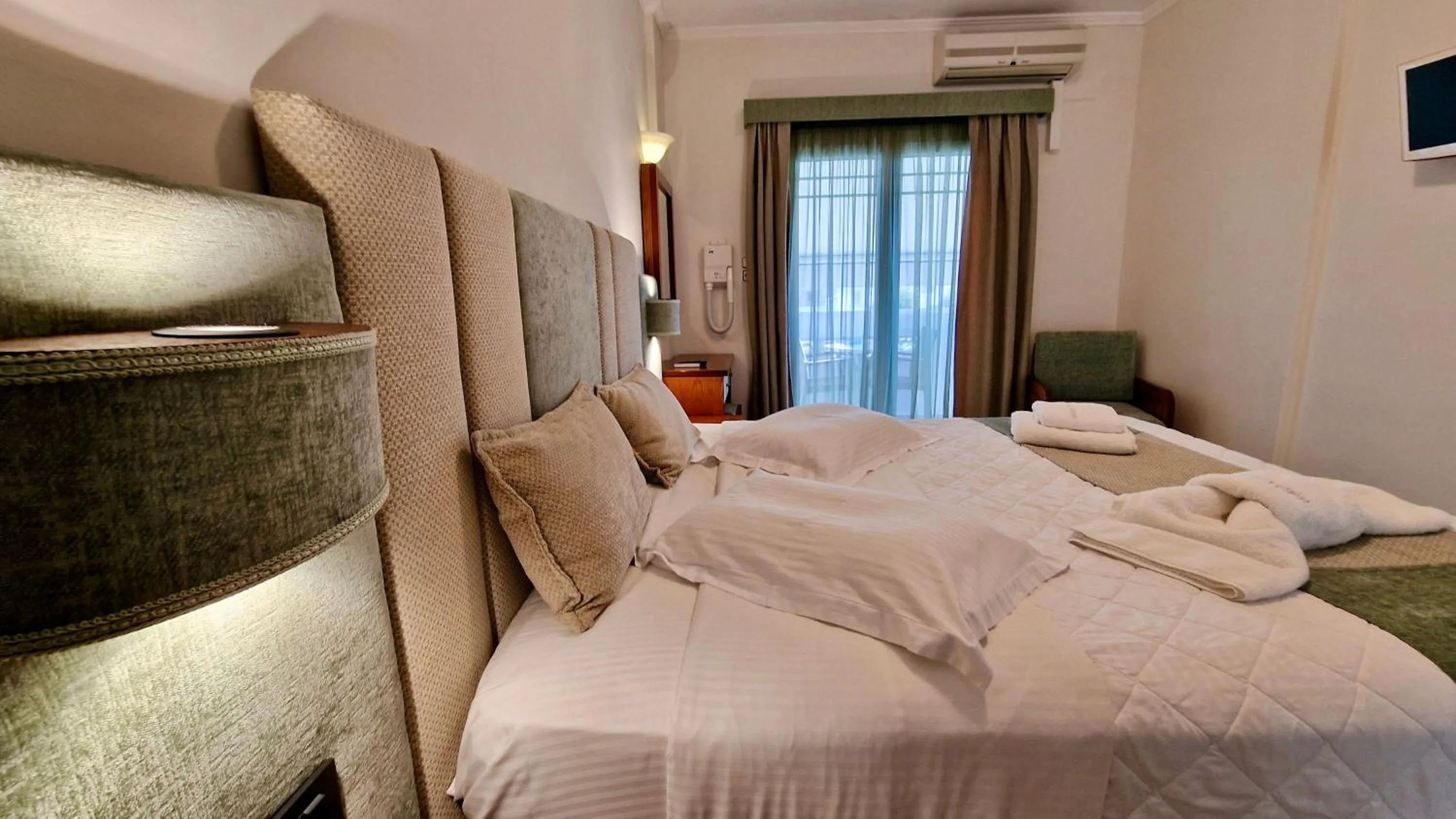 Bed in Hotel Dionysis Studios