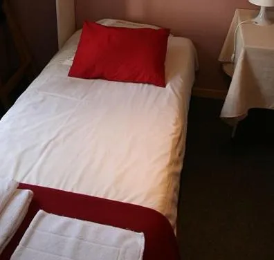 Bed in Hotel Anvers