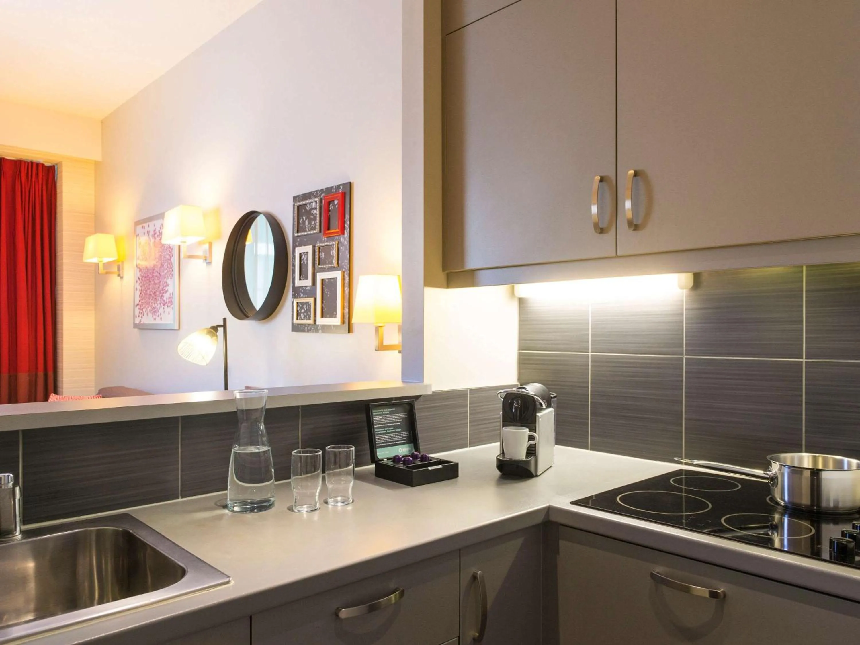 Photo of the whole room in Aparthotel Adagio Brussels Grand Place