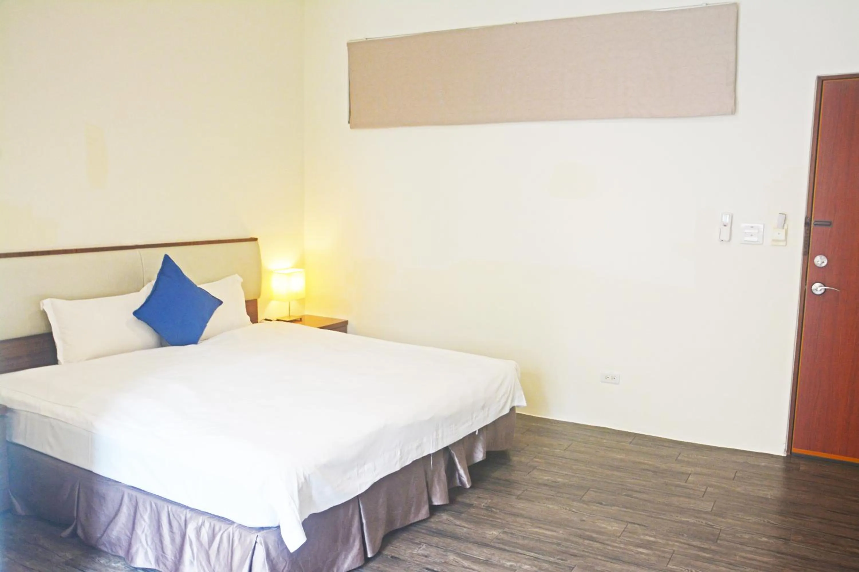 Bed in NCNU Campus Inn暨大行旅