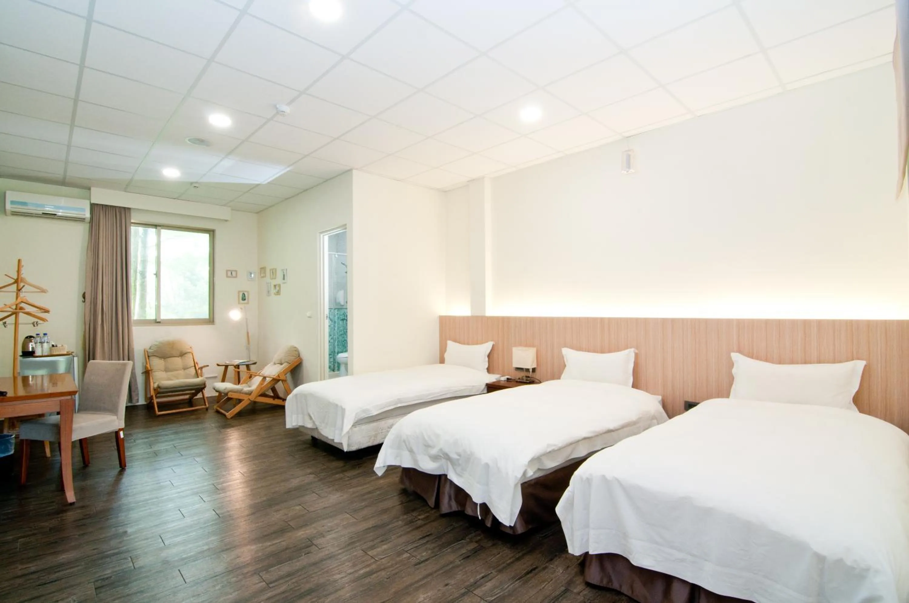 Bed in NCNU Campus Inn暨大行旅