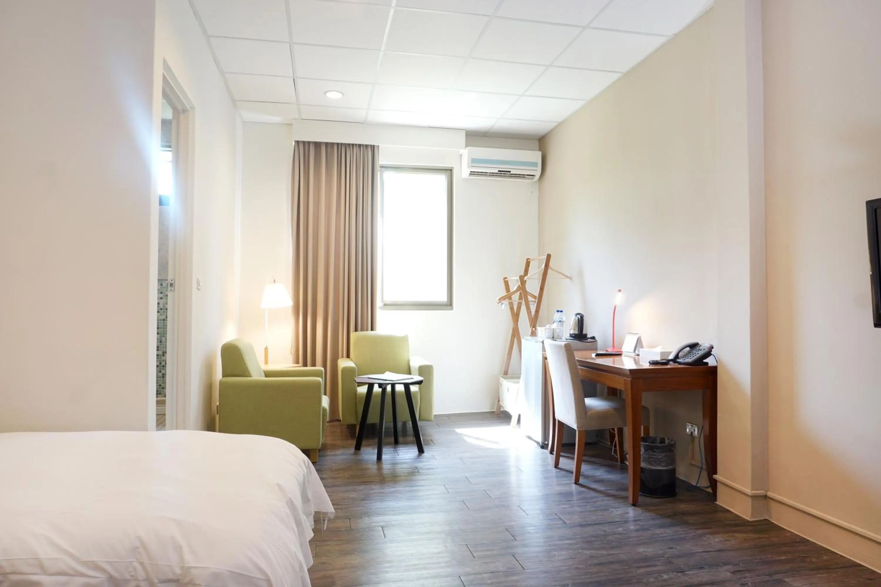 Bed in NCNU Campus Inn暨大行旅