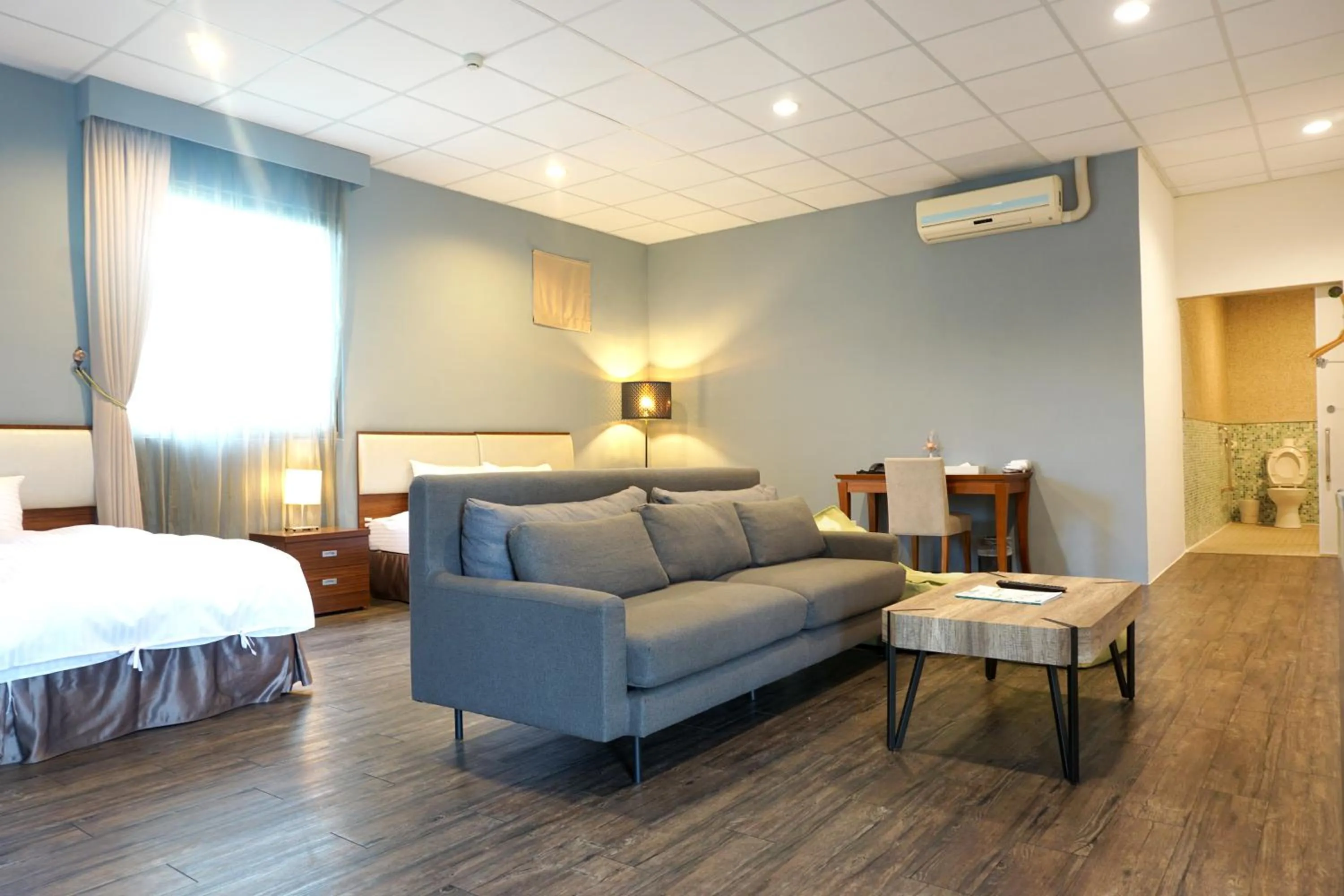 Photo of the whole room, Bed in NCNU Campus Inn暨大行旅