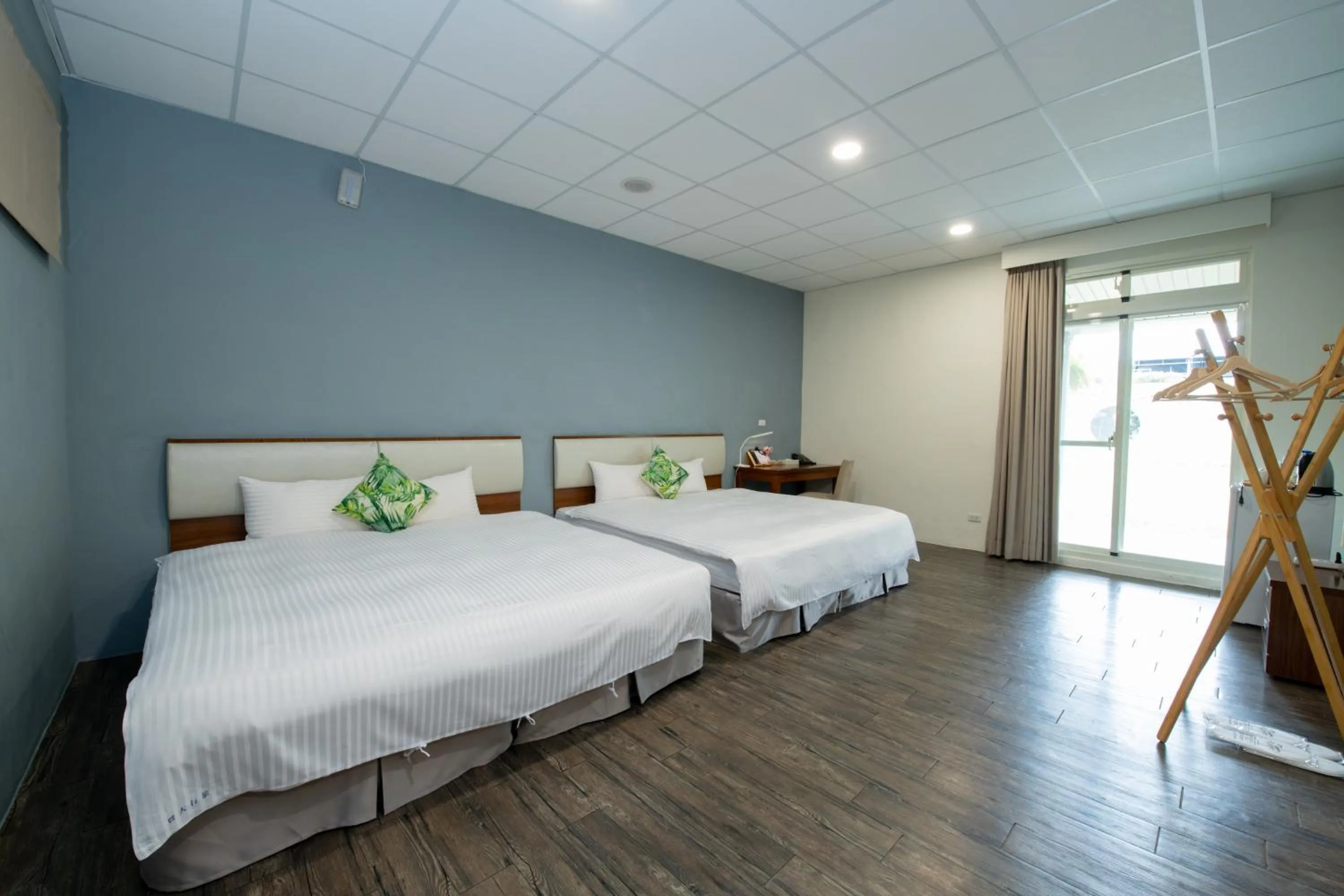 Photo of the whole room, Bed in NCNU Campus Inn暨大行旅