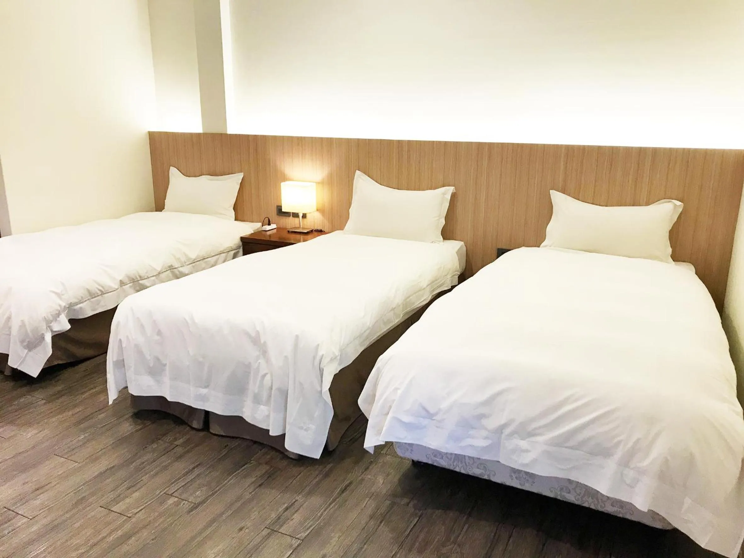 Bed in NCNU Campus Inn暨大行旅