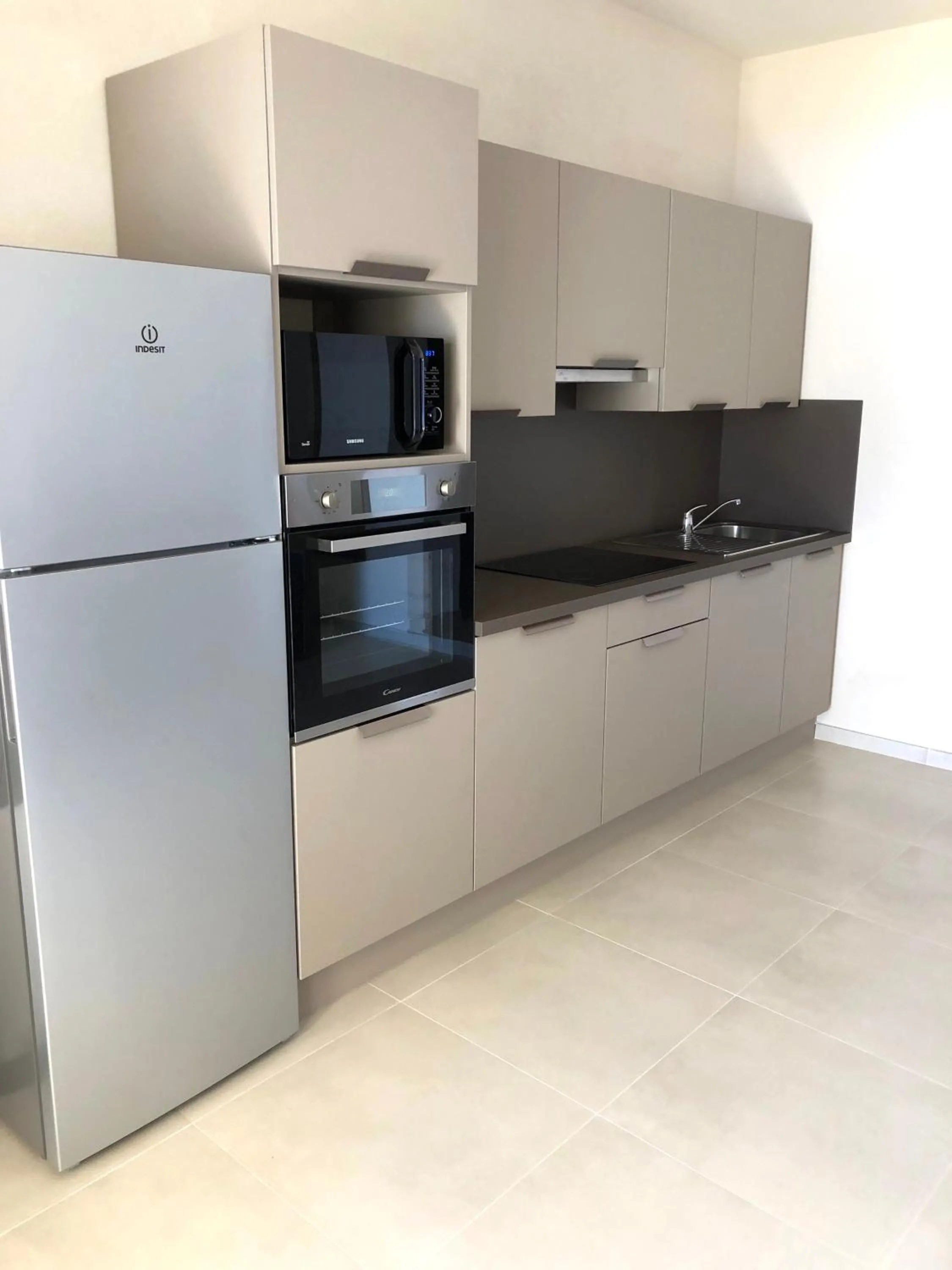 Kitchen or kitchenette in Hôtel et Résidence Ta Kladia - Omigna