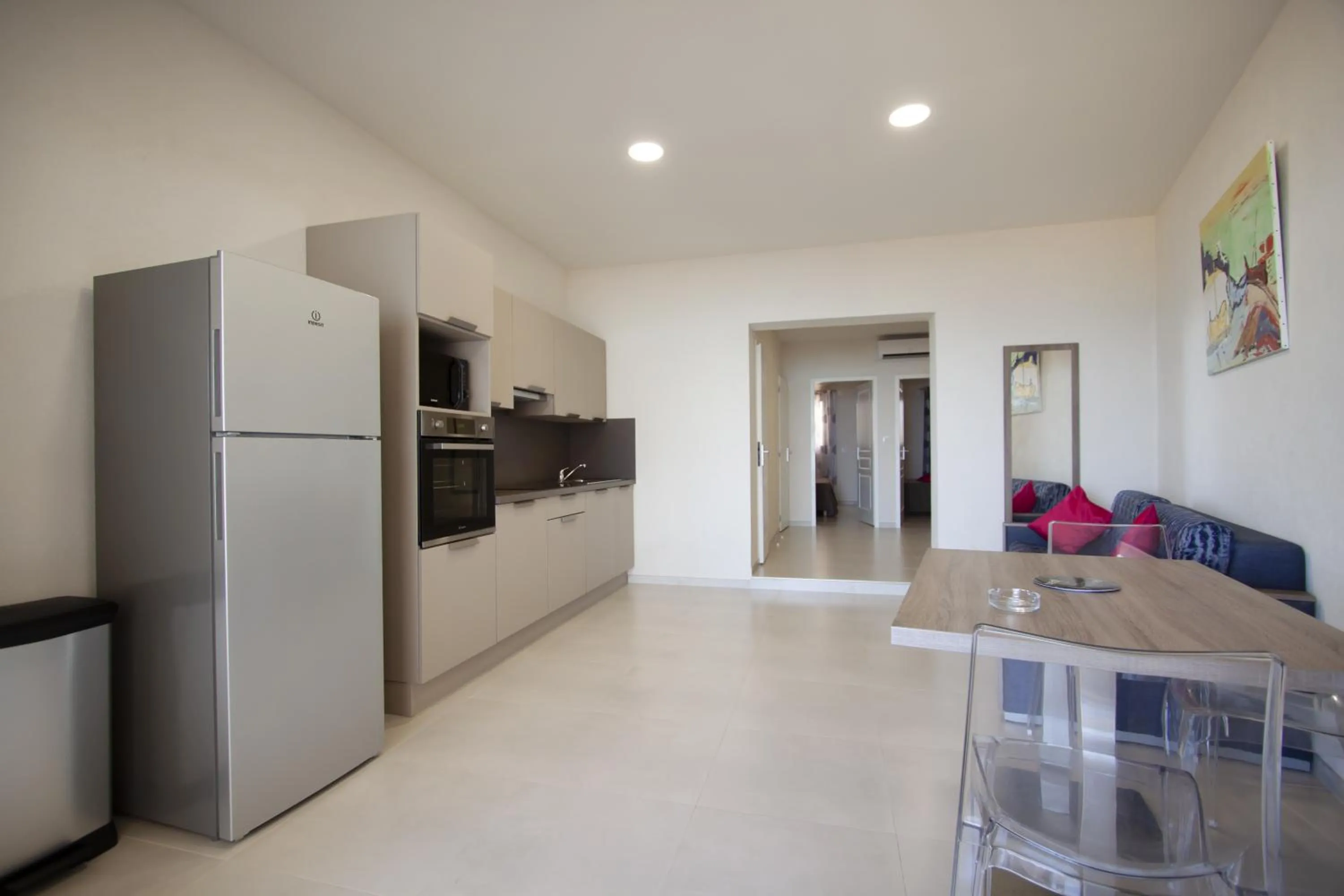 Kitchen or kitchenette in Hôtel et Résidence Ta Kladia - Omigna